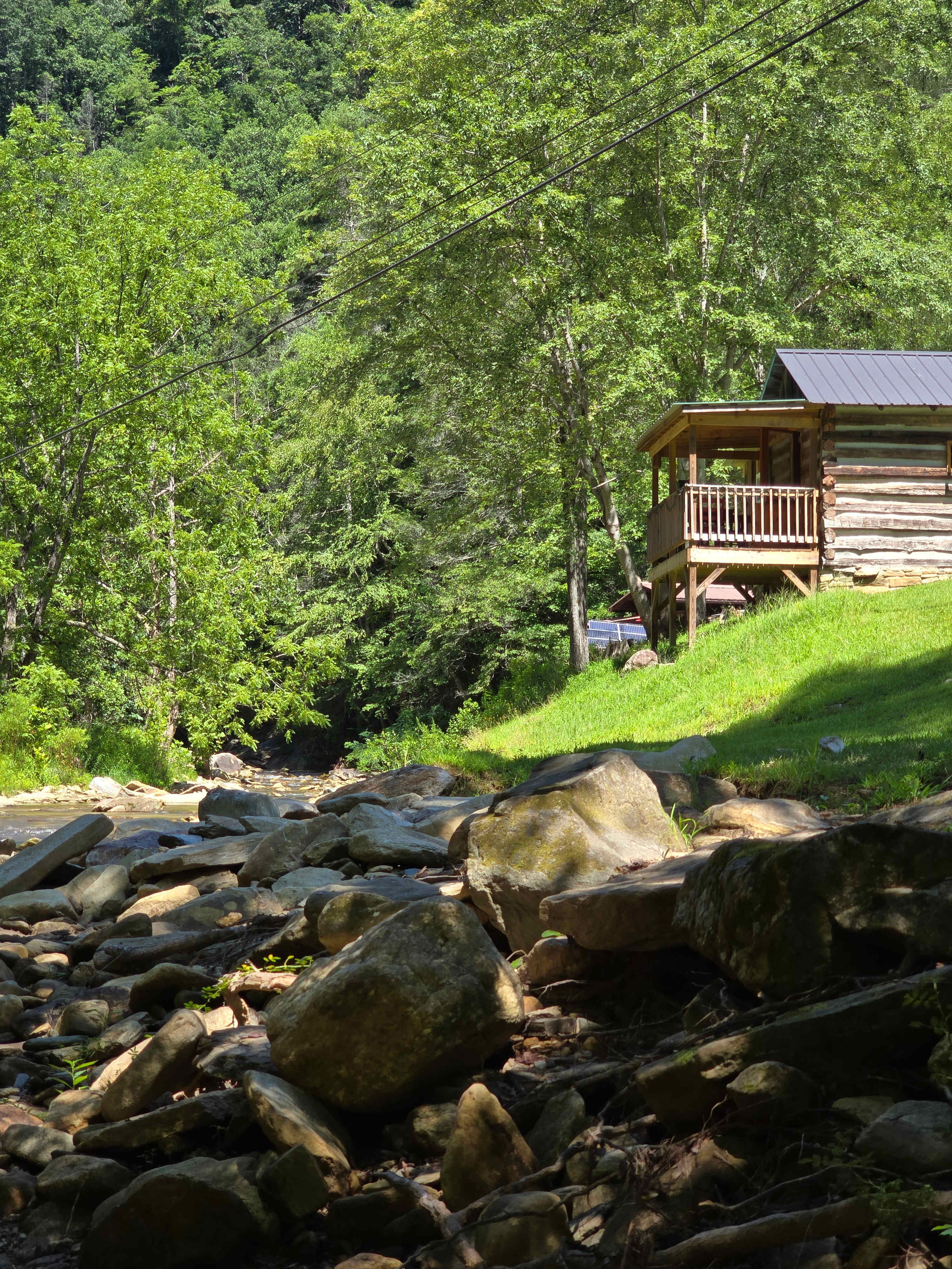 Back deck of cabin overlooking the creek. 