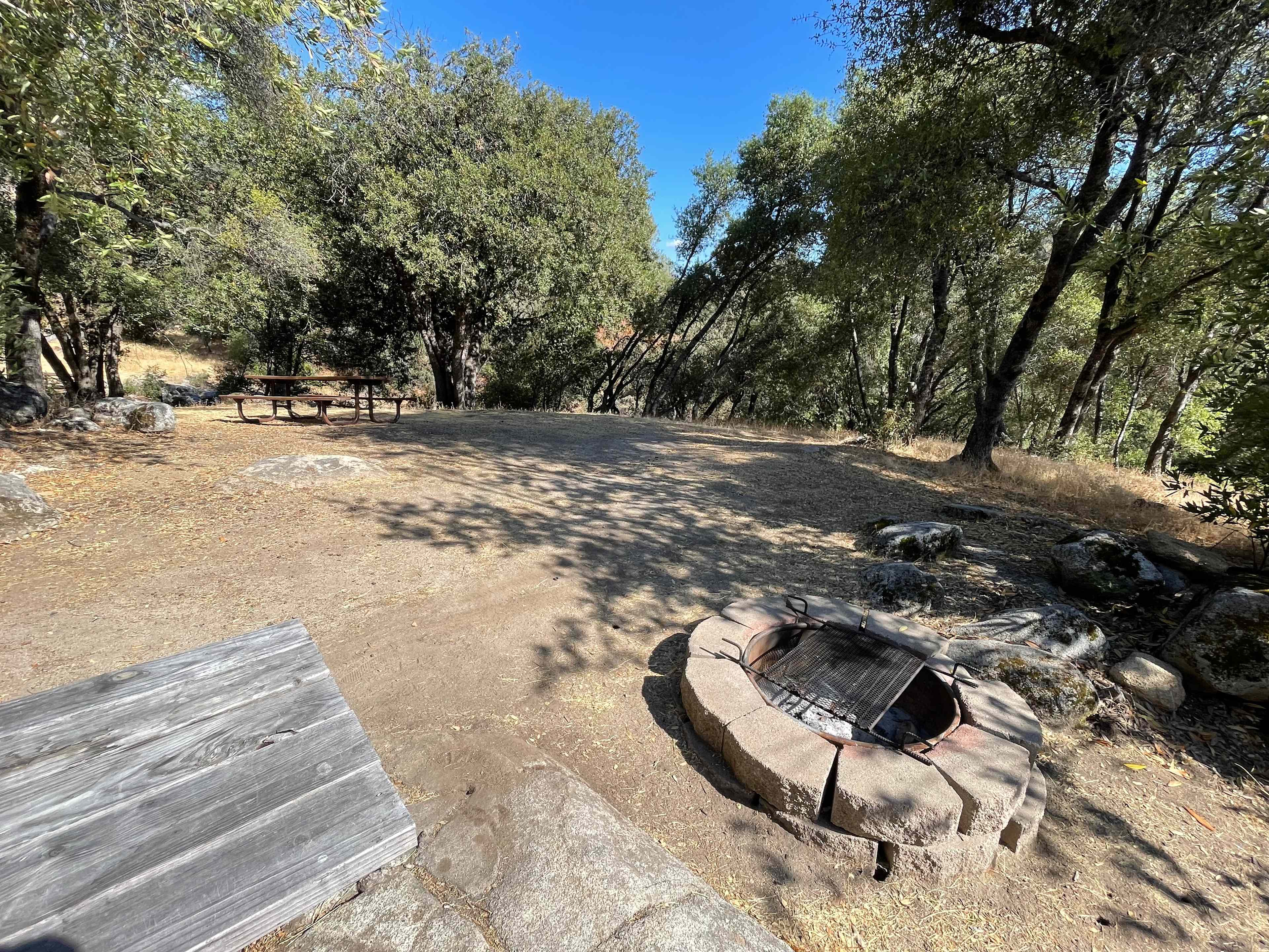 Very spacious! Could easily fit multiple tents here, as long as you don’t mind uneven ground. Also the fire pit is perfectly positioned to sit around and watch the sunset behind the hills across the way. 