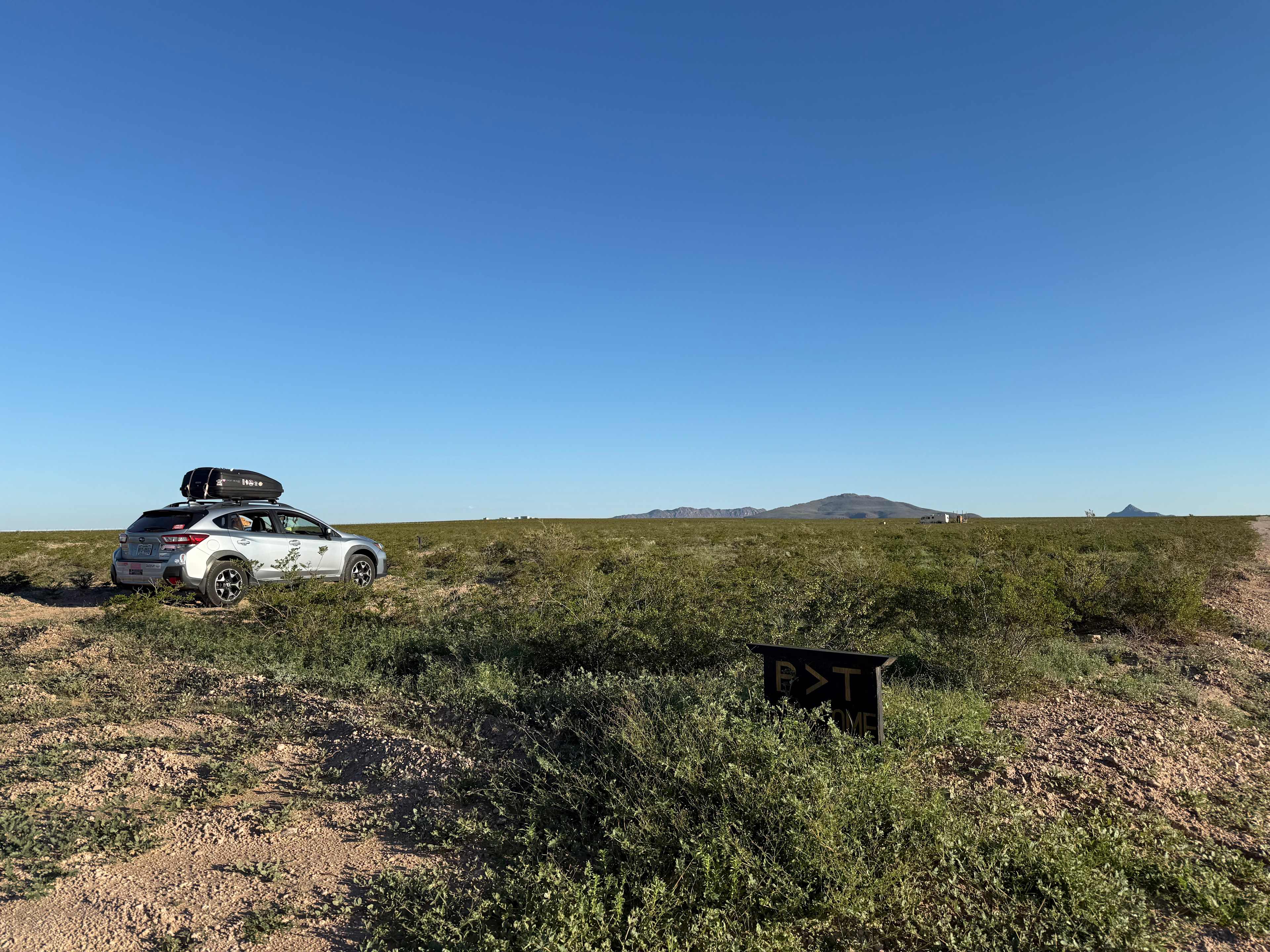 Entrance to campsites from the gravel drive
