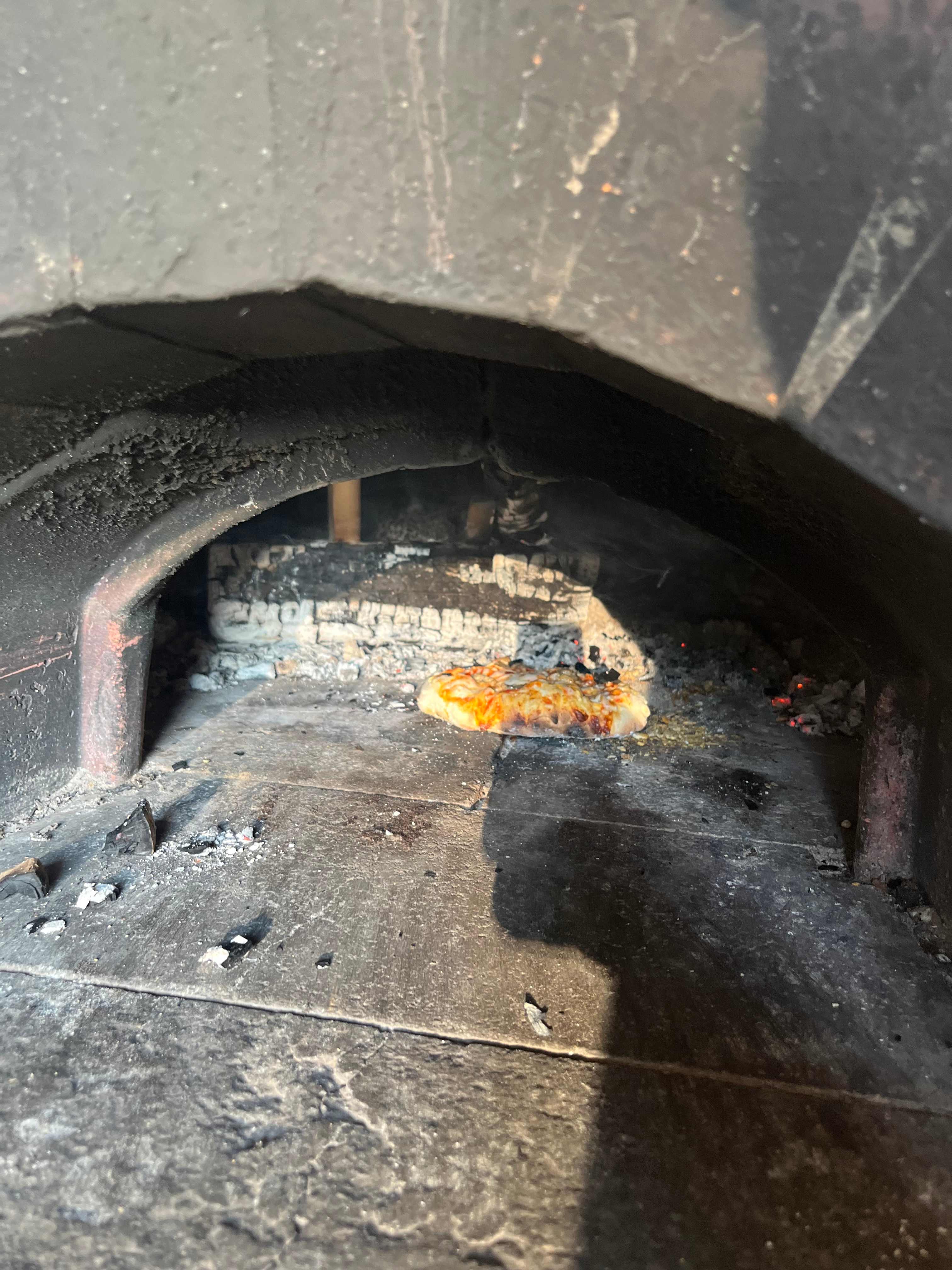 Outdoor Pizza Kitchen’s oven at work…