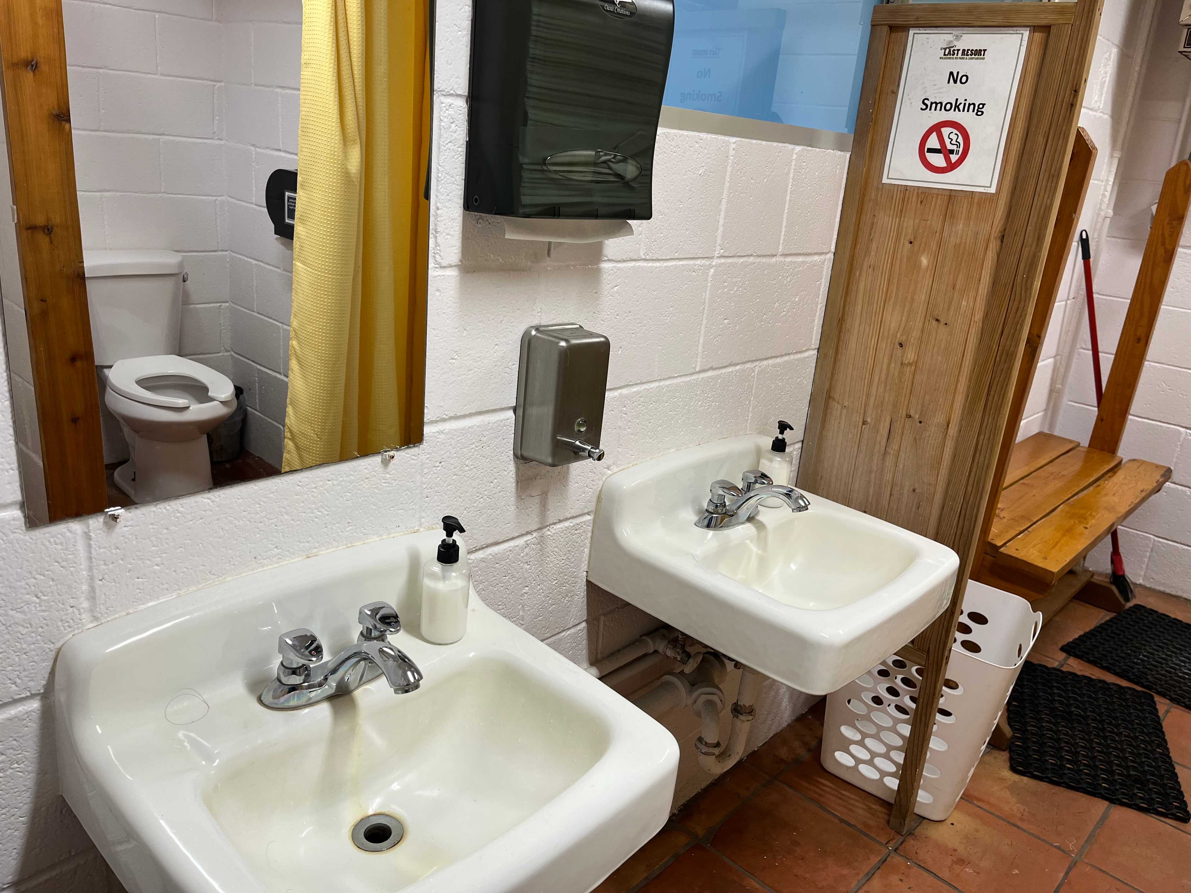 two sinks, clean and well-stocked