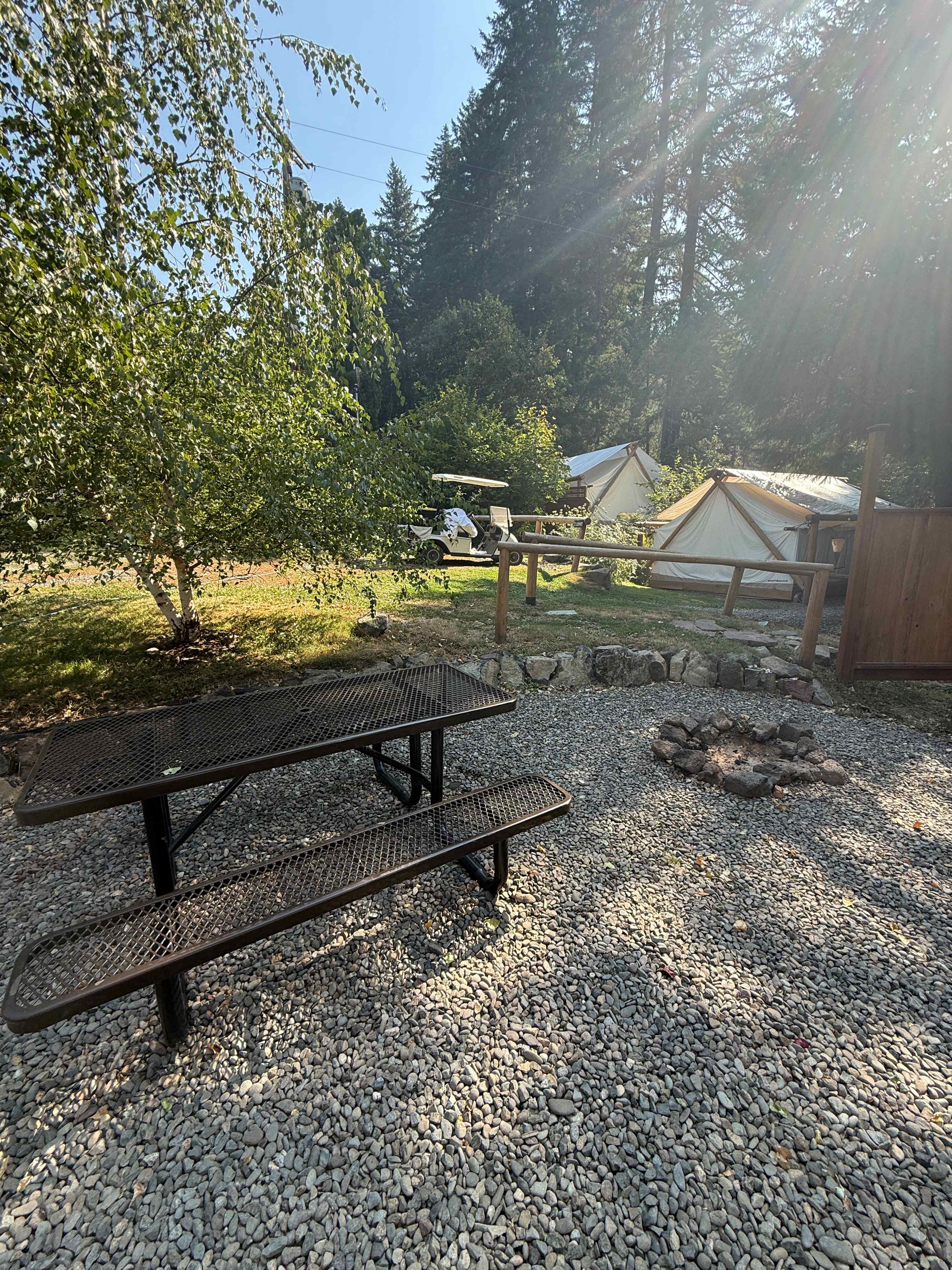 Our campsite spot with picnic table and firepit
