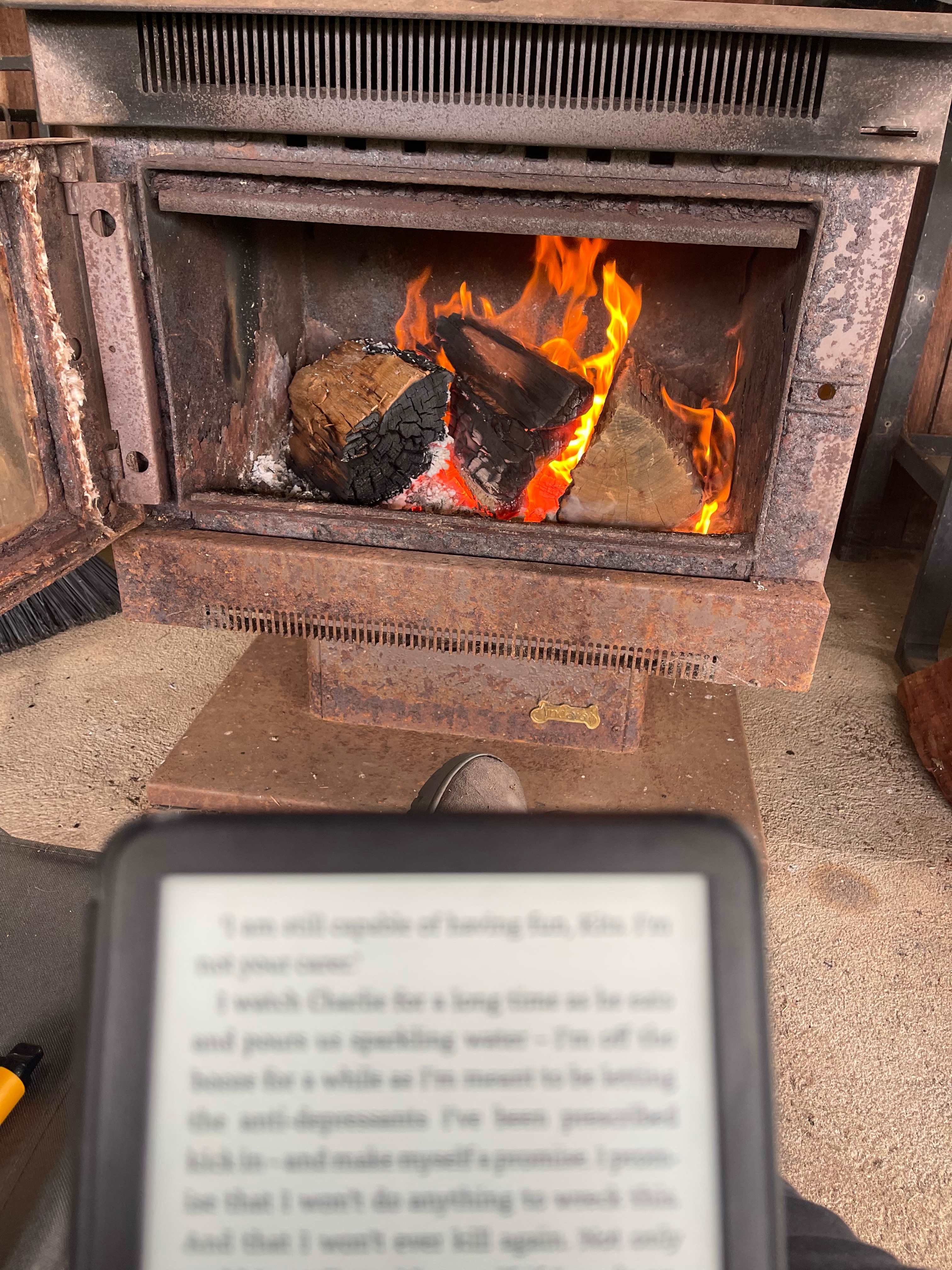 Reading by one of the three fire places 