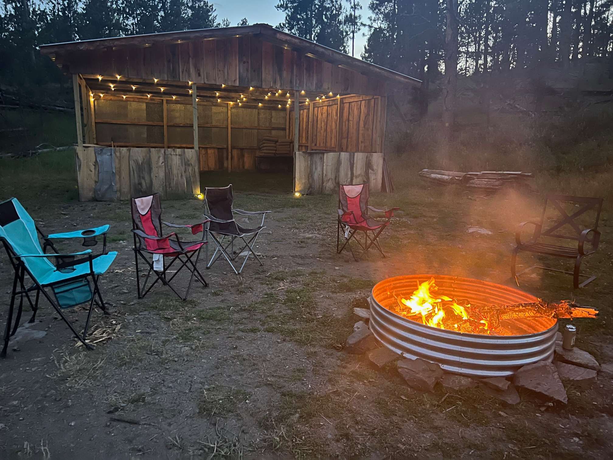 Big fire pit and plenty of wood to burn.