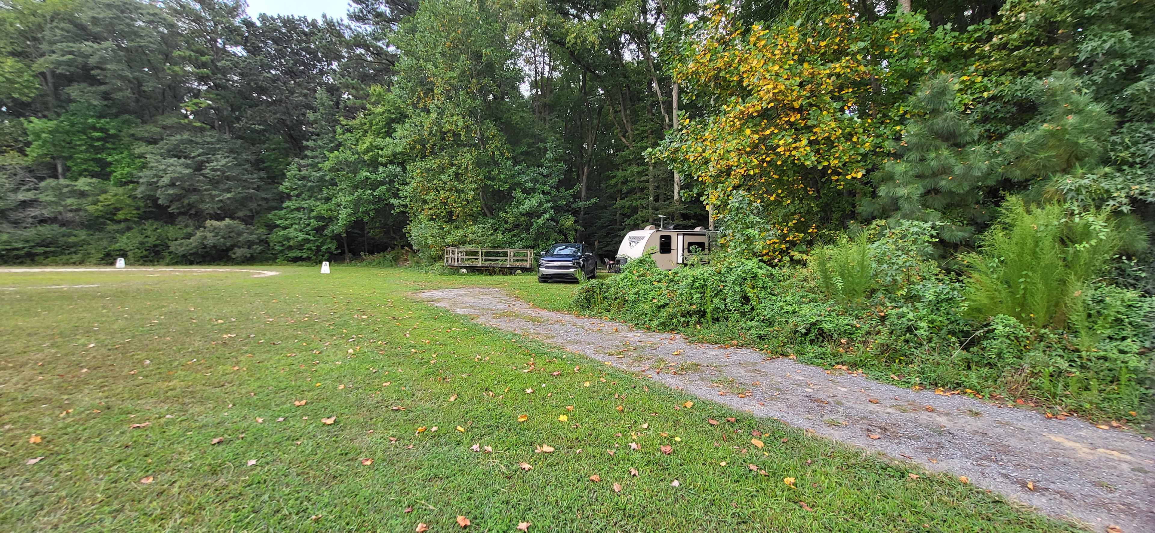 Site tucked in at back of property. 