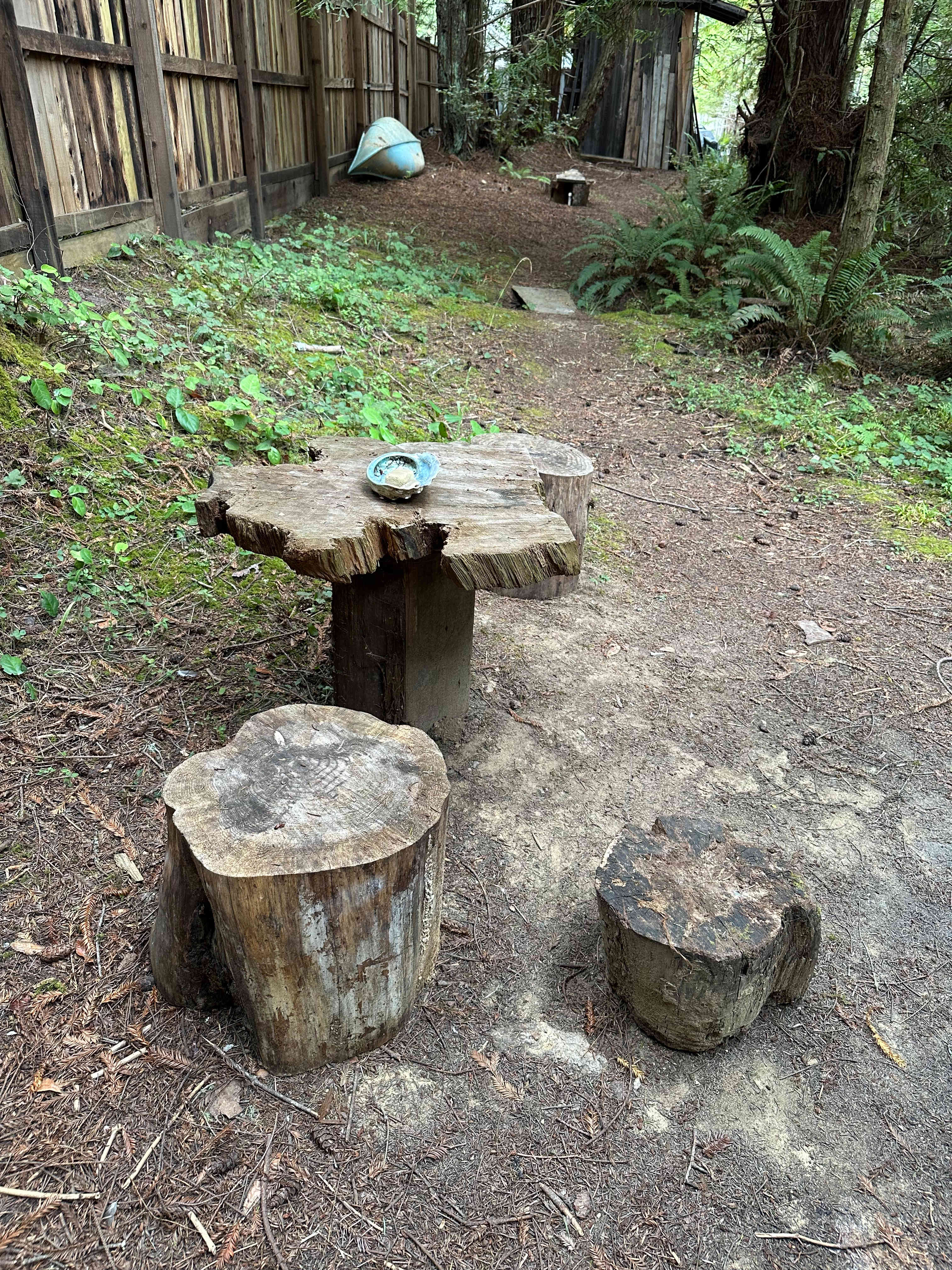 Table with stools at Mushroom Cabin