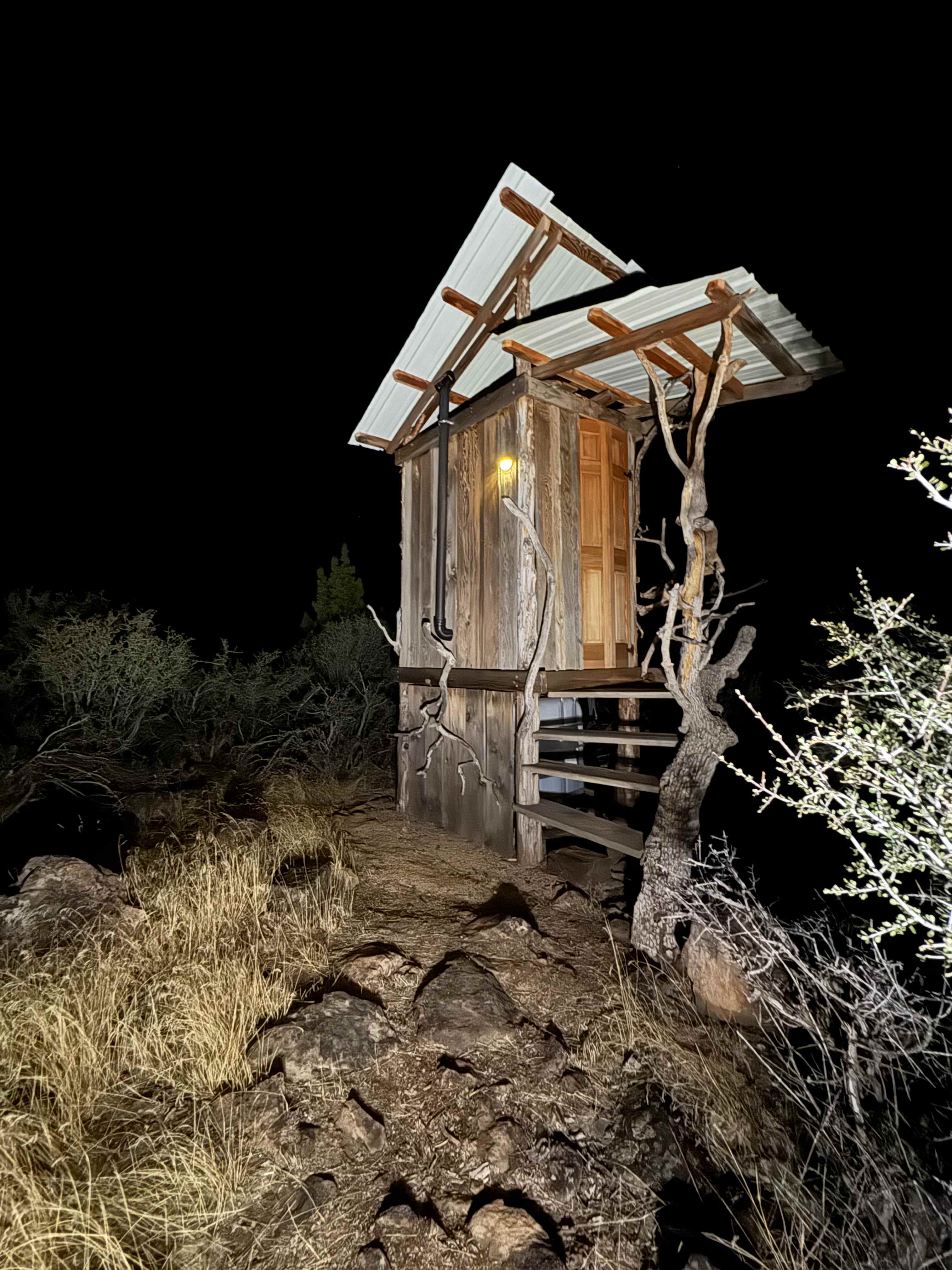 Compost outhouse, clean and stocked with supplies. 