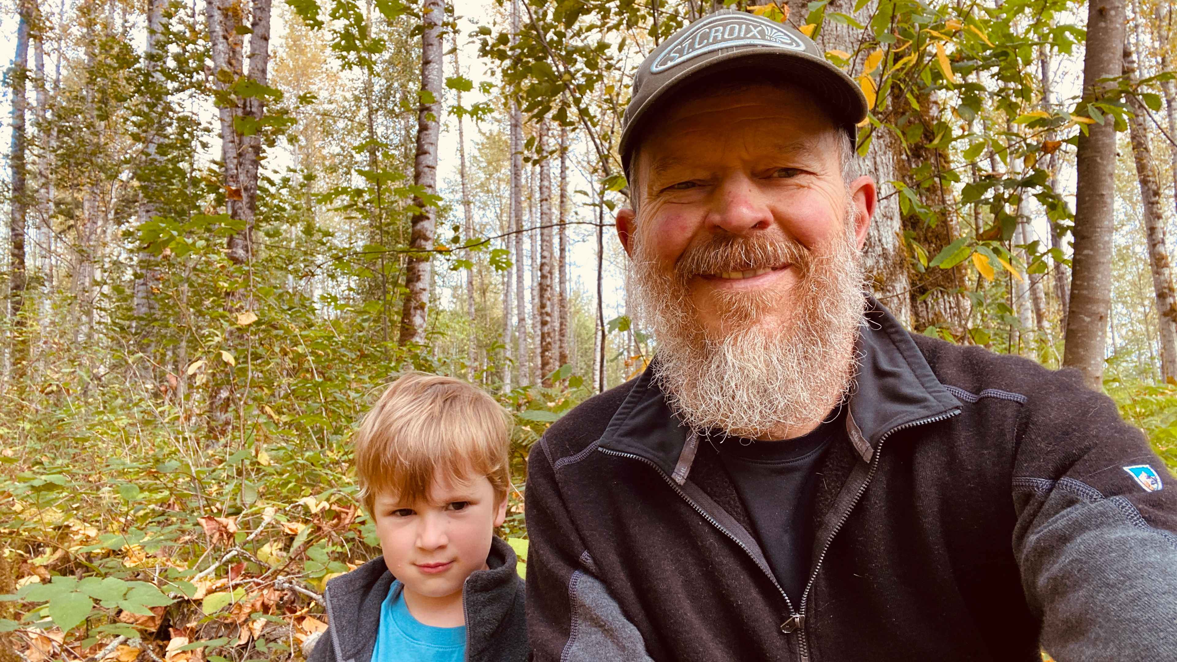 Top of the hill at public trail intersection.  