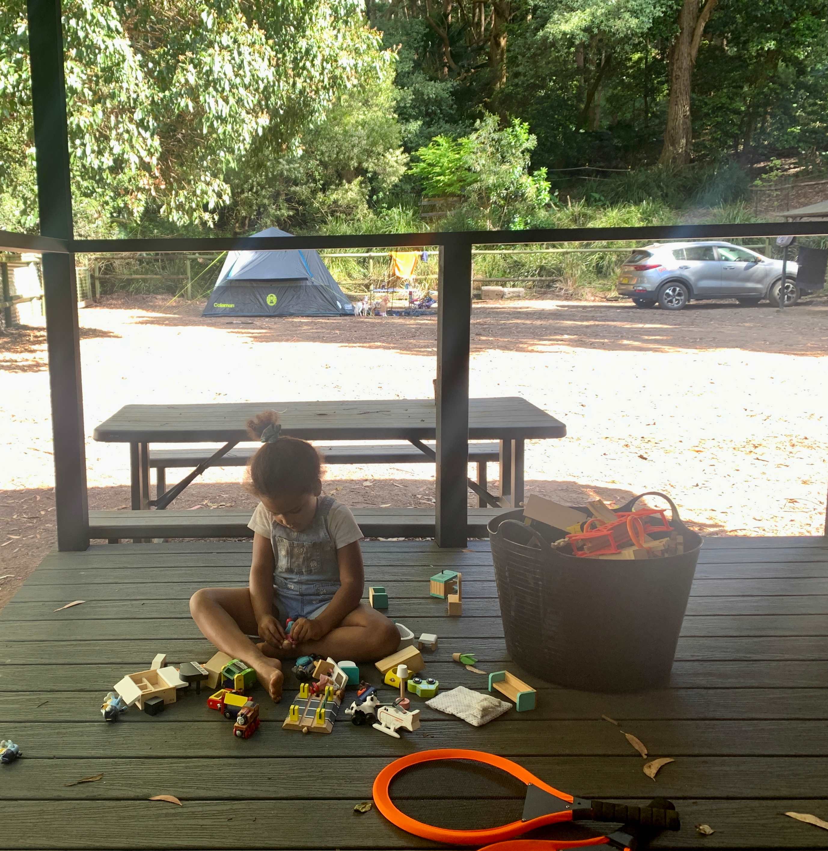 Tub of toys provided, on the covered deck outside the kitchen. 