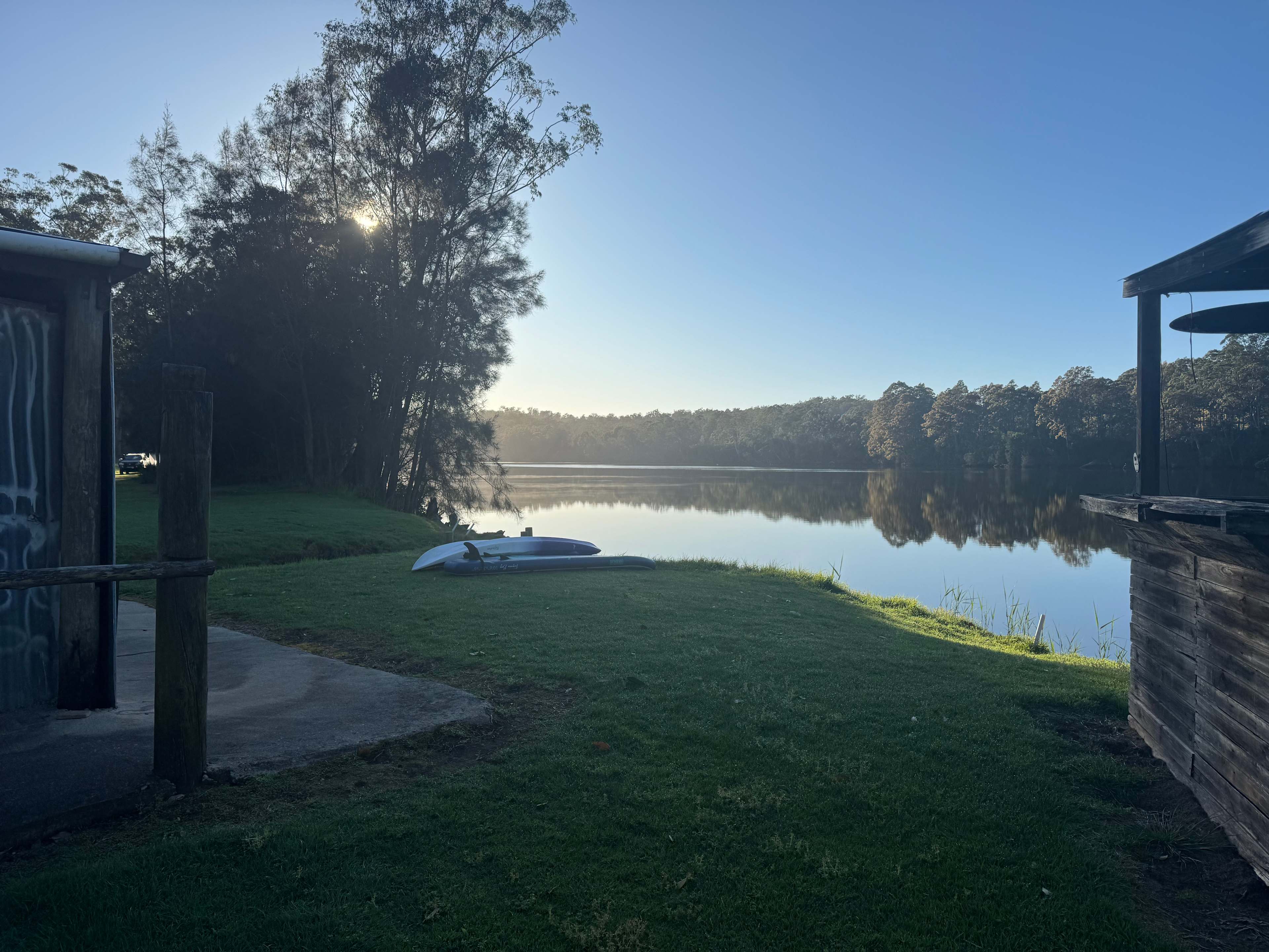View past the camp kitchen to boat ramp and river