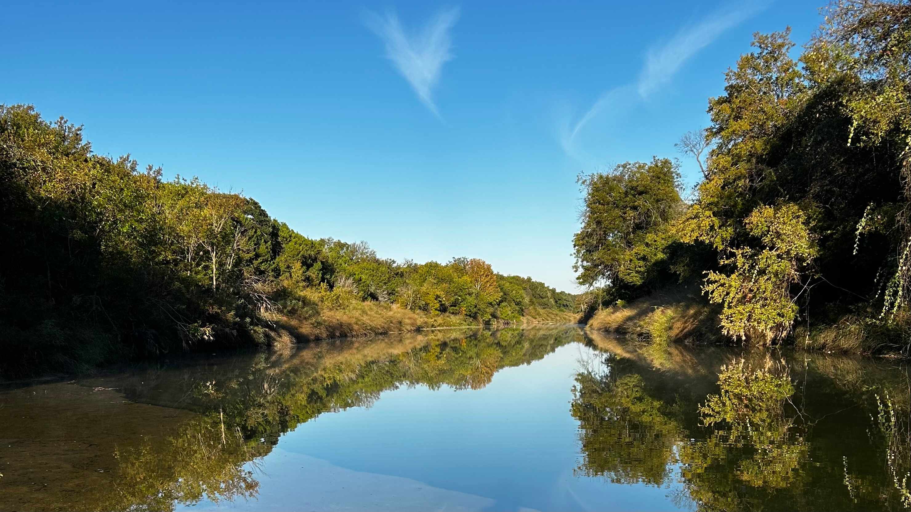 Standing in the river, enjoying the quiet of the mornings.