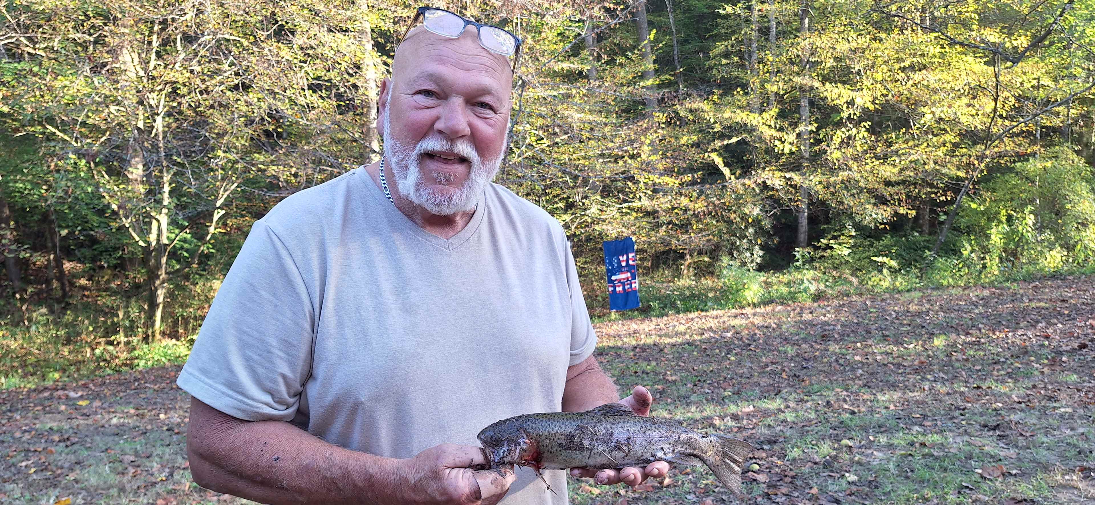 My dad's 1st ever trout!