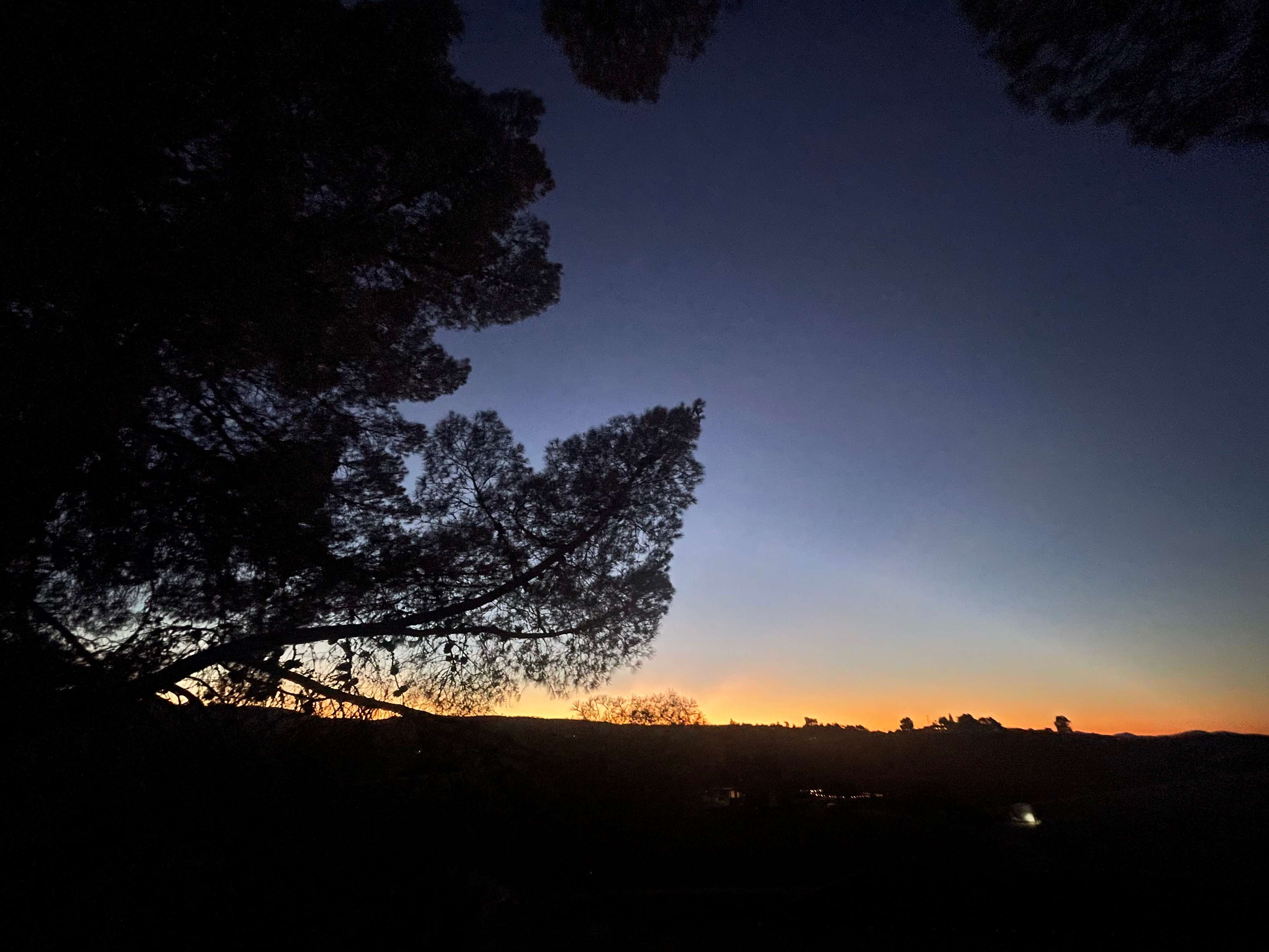 Post sunset view from driveway past Dream Catcher Trailer
