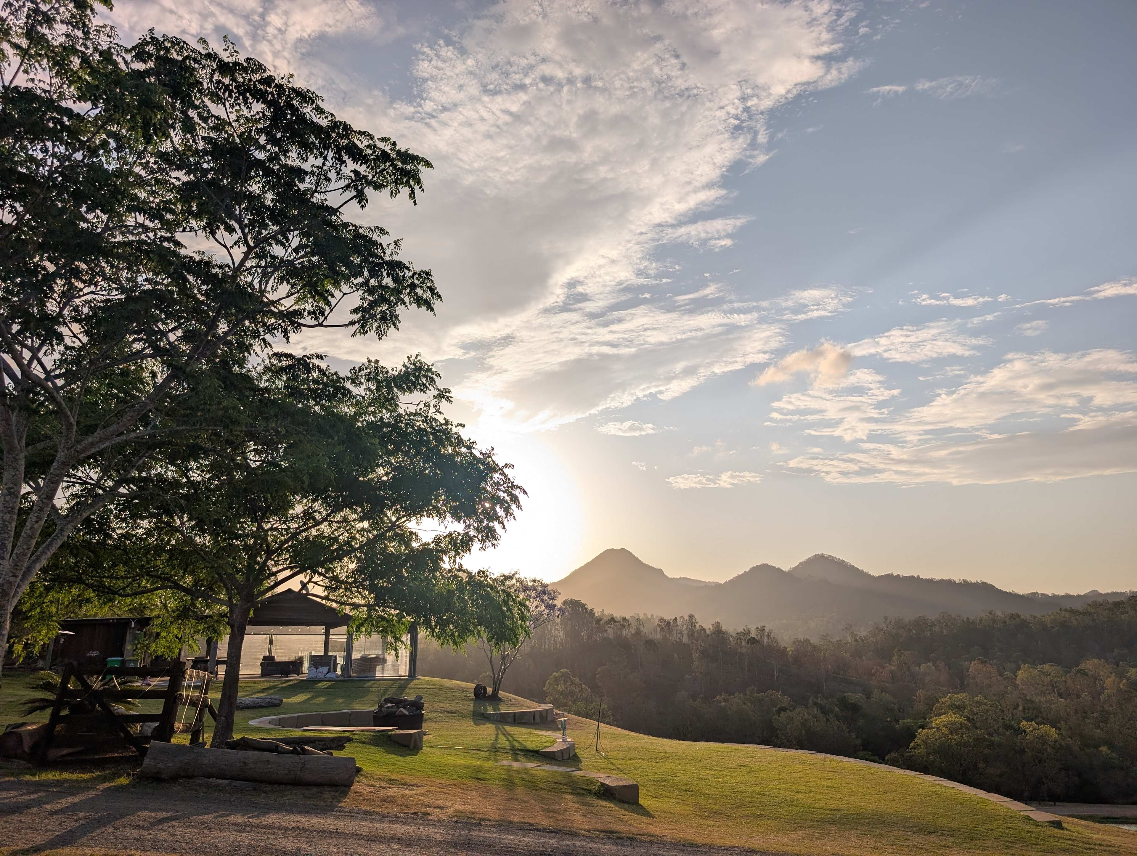 View from the communal area - massive fire pit with a big seat surrounding it!