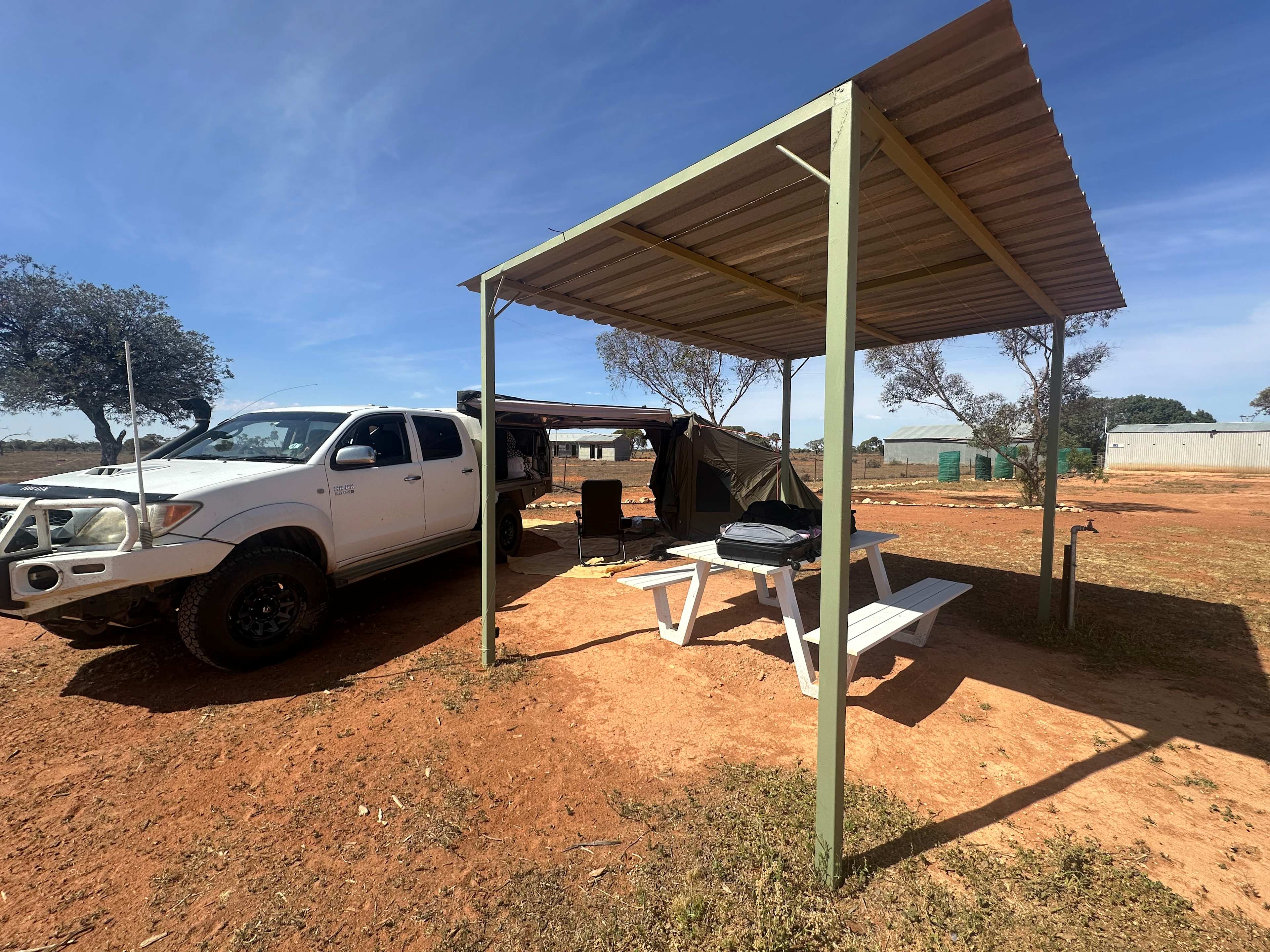 A great bench and shelter for your convenience when camping! 