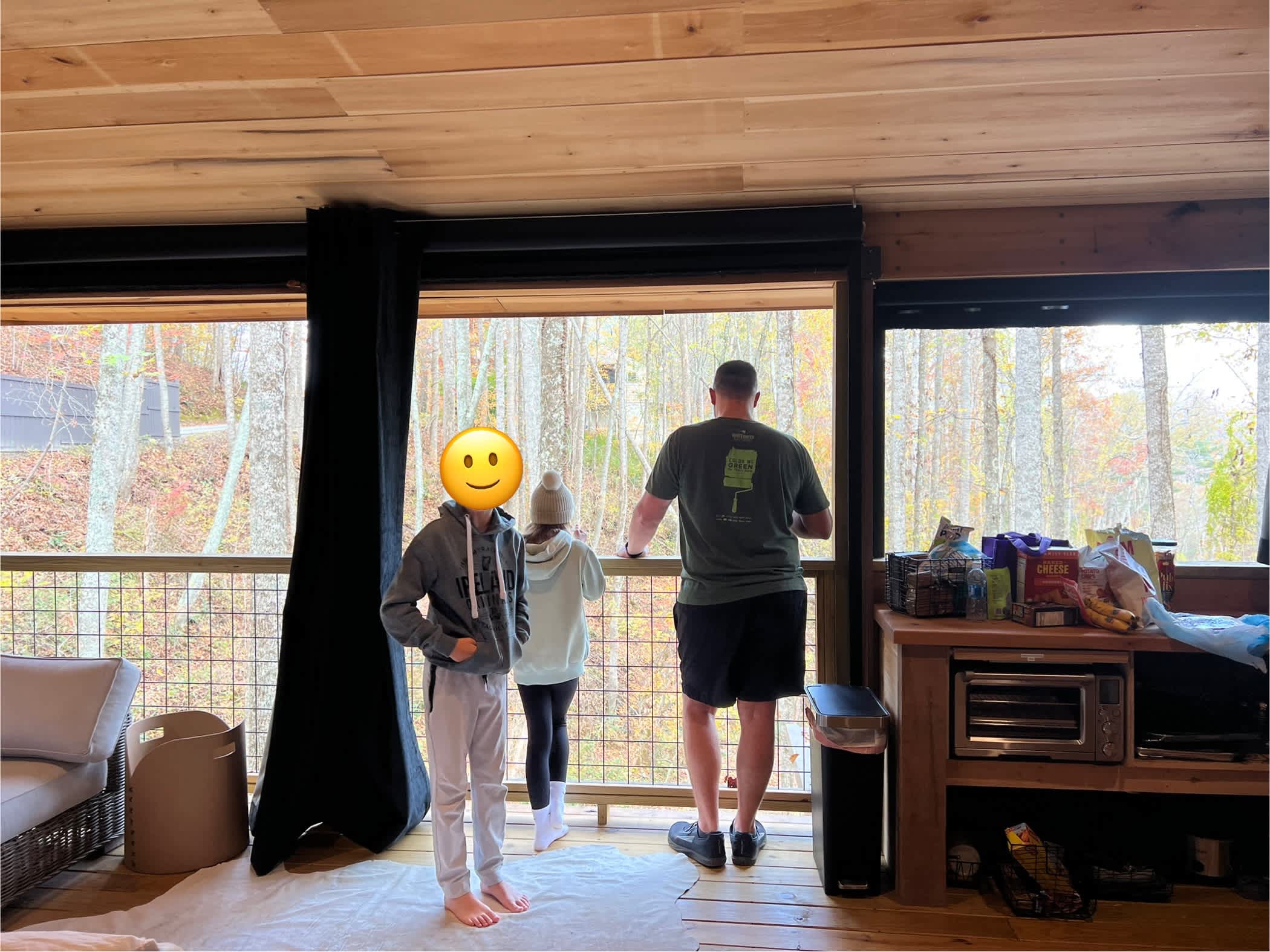 Motorized screen raised. Looking out towards fire pit. 