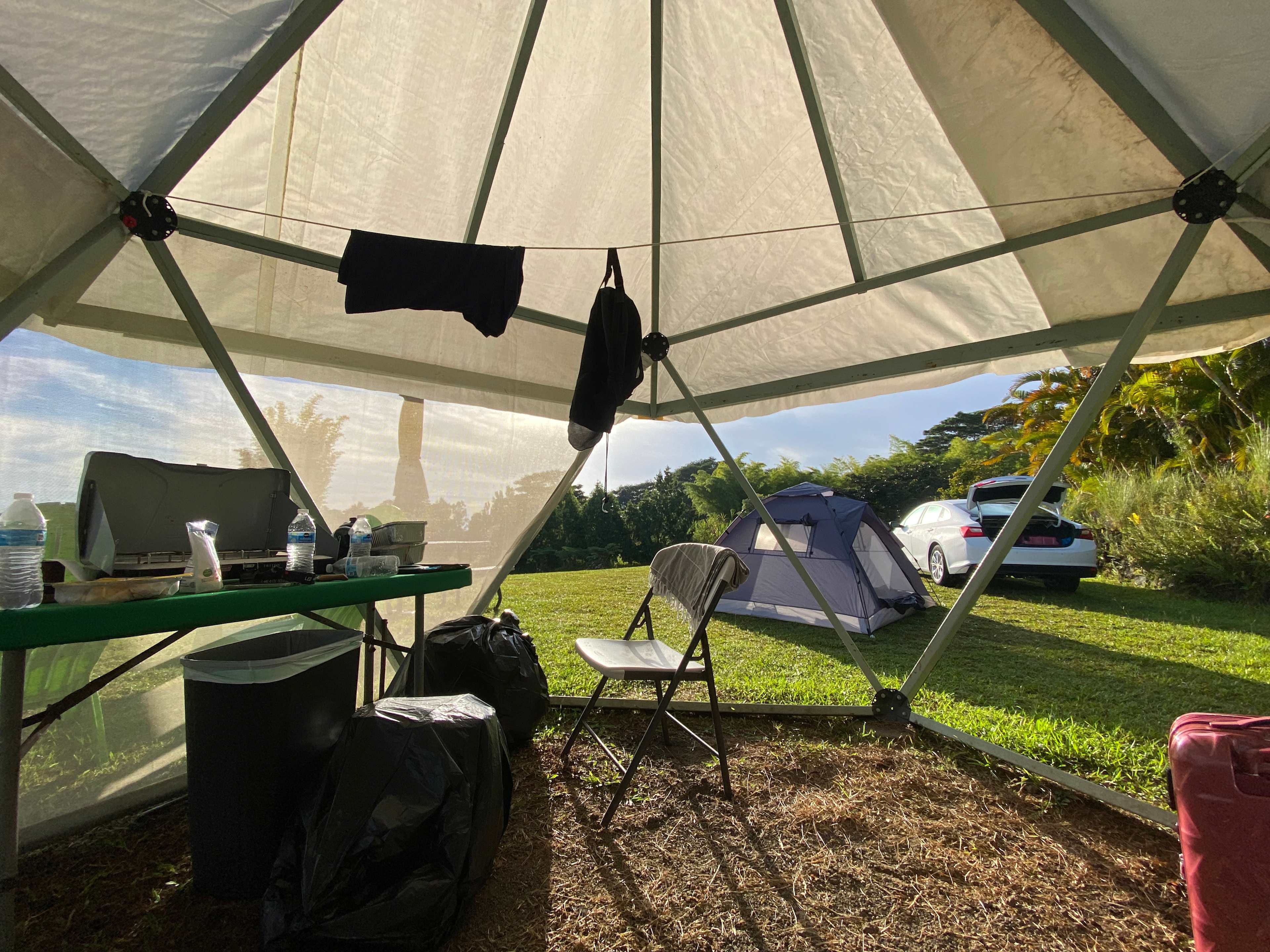 sun/rain dome. table, a lot of chairs