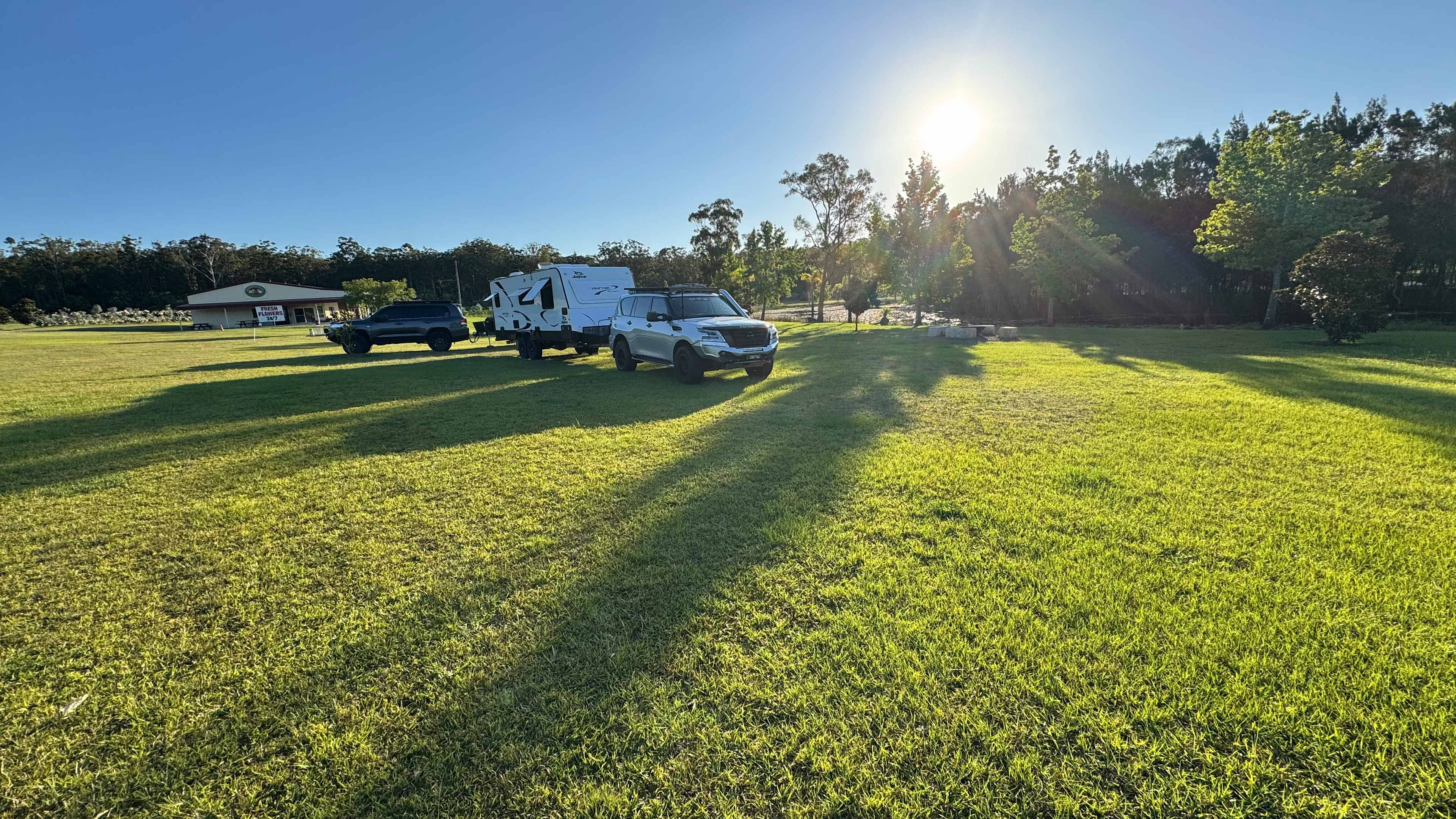 Flat grassed area next to the lake