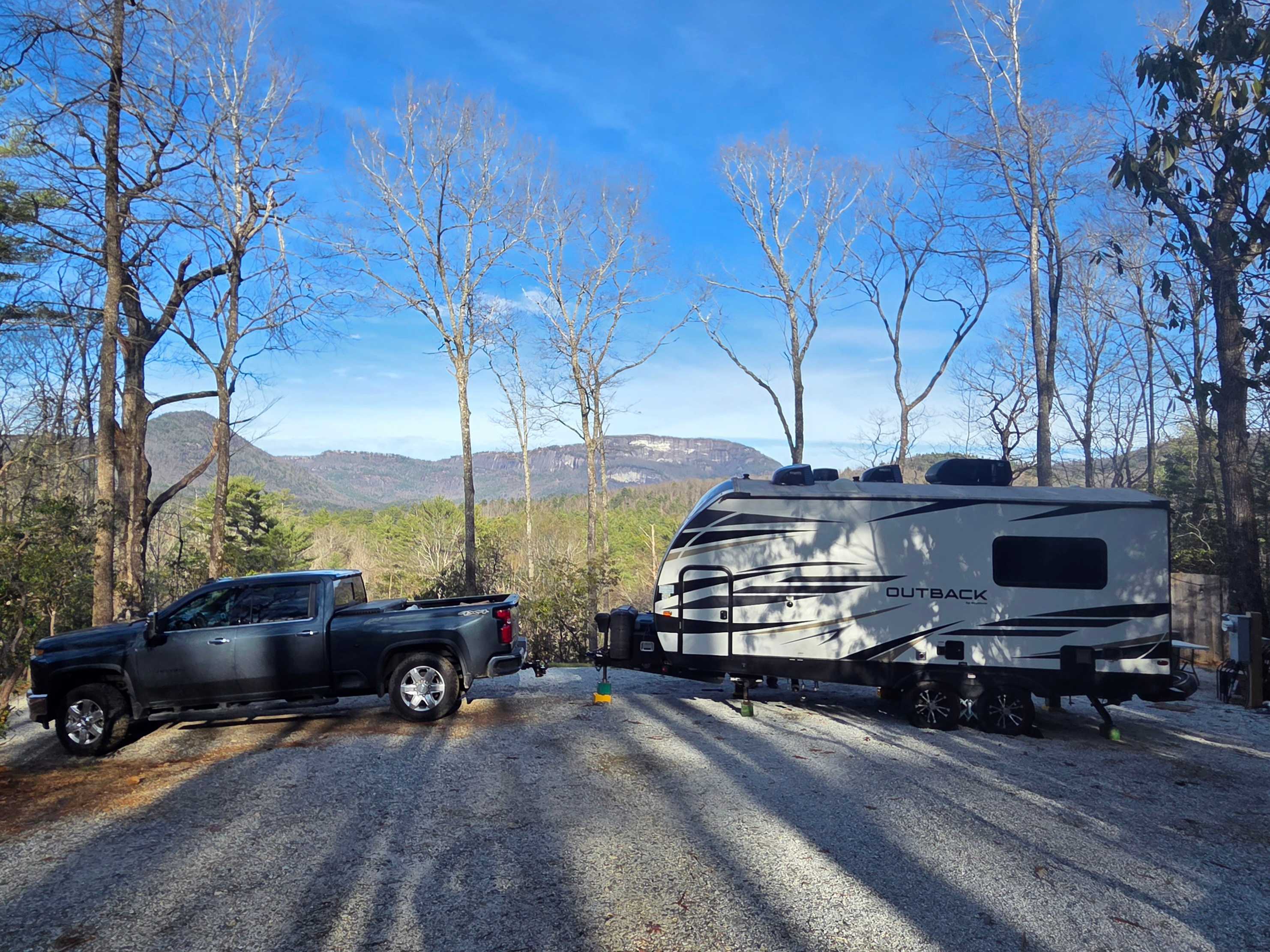 Slightly dig in uphill tires and put downhill tires on 2 high ramps to get level