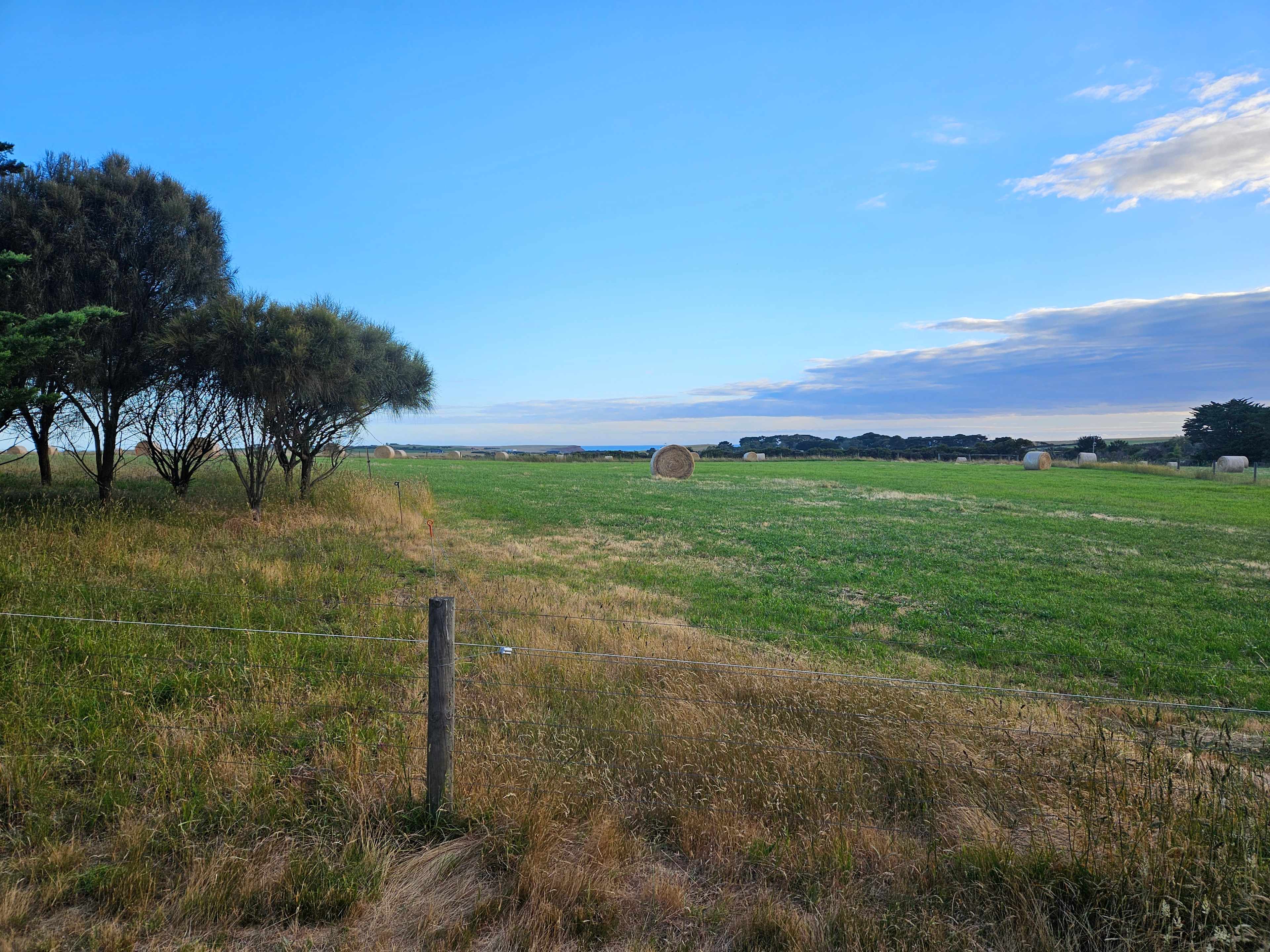 Across the paddock towards the ocean parked
