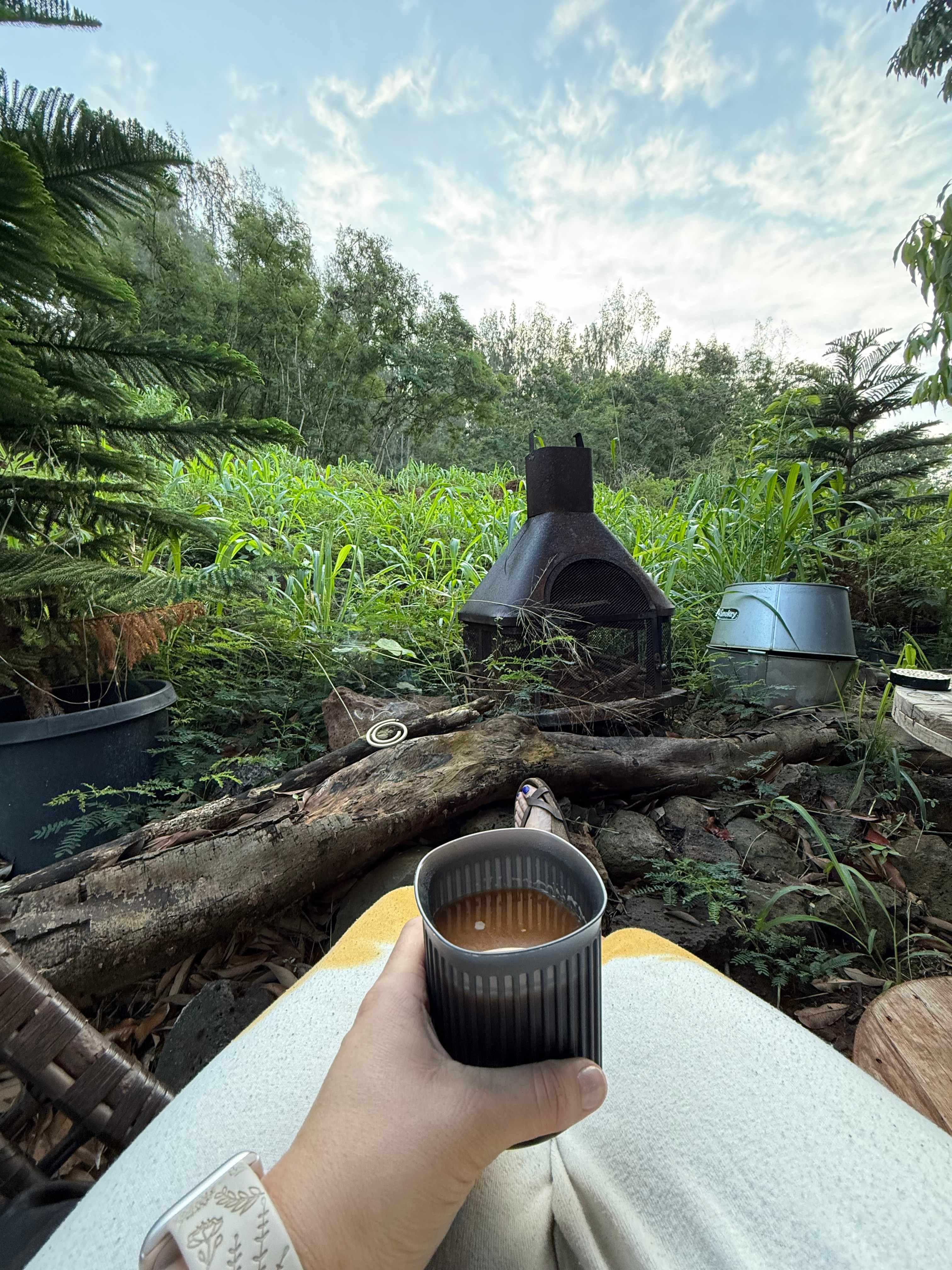 Coffee every morning, under the canopy tent, steps outside the trailers door.