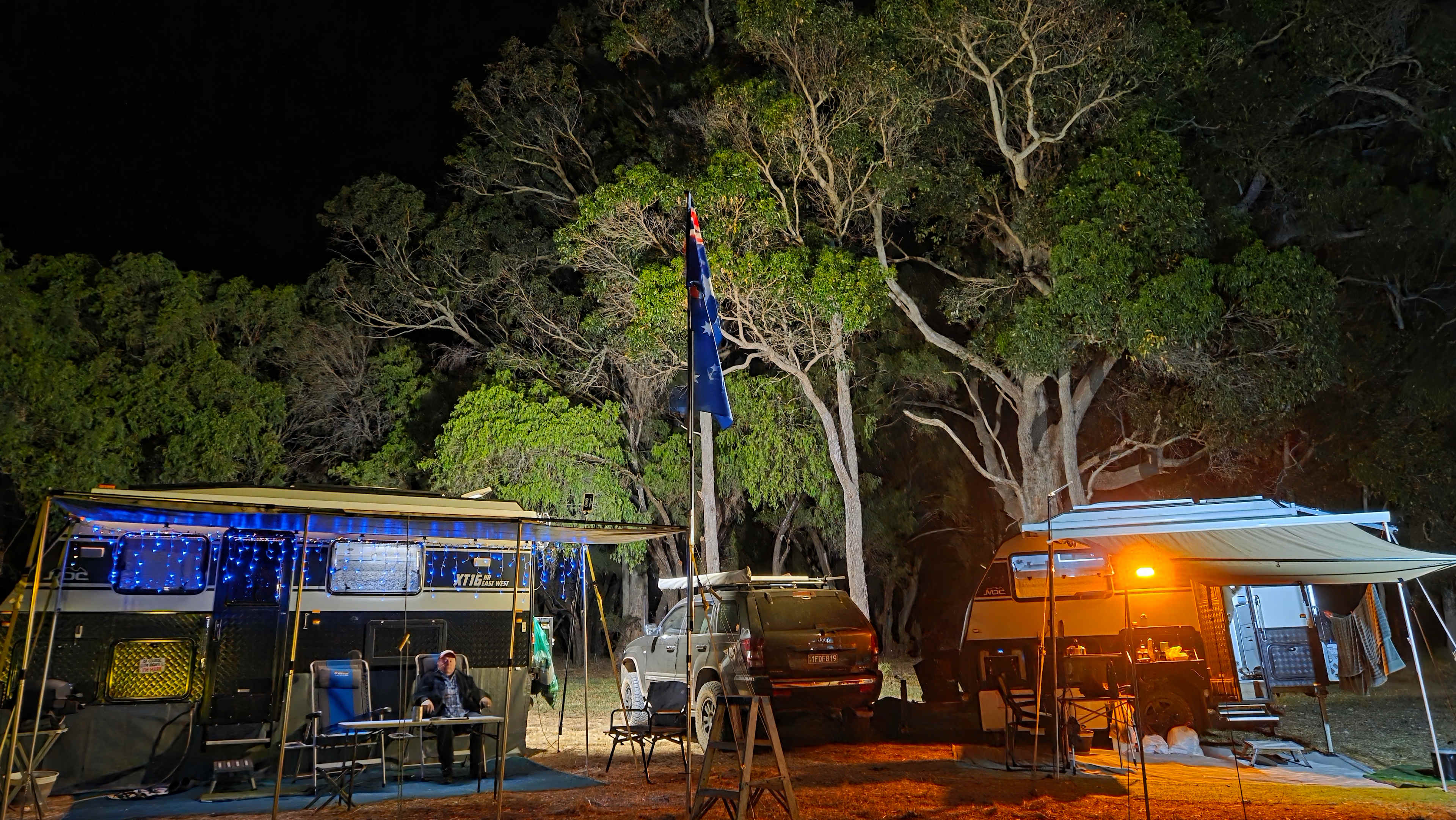 Great night shot in front of the beautiful trees.