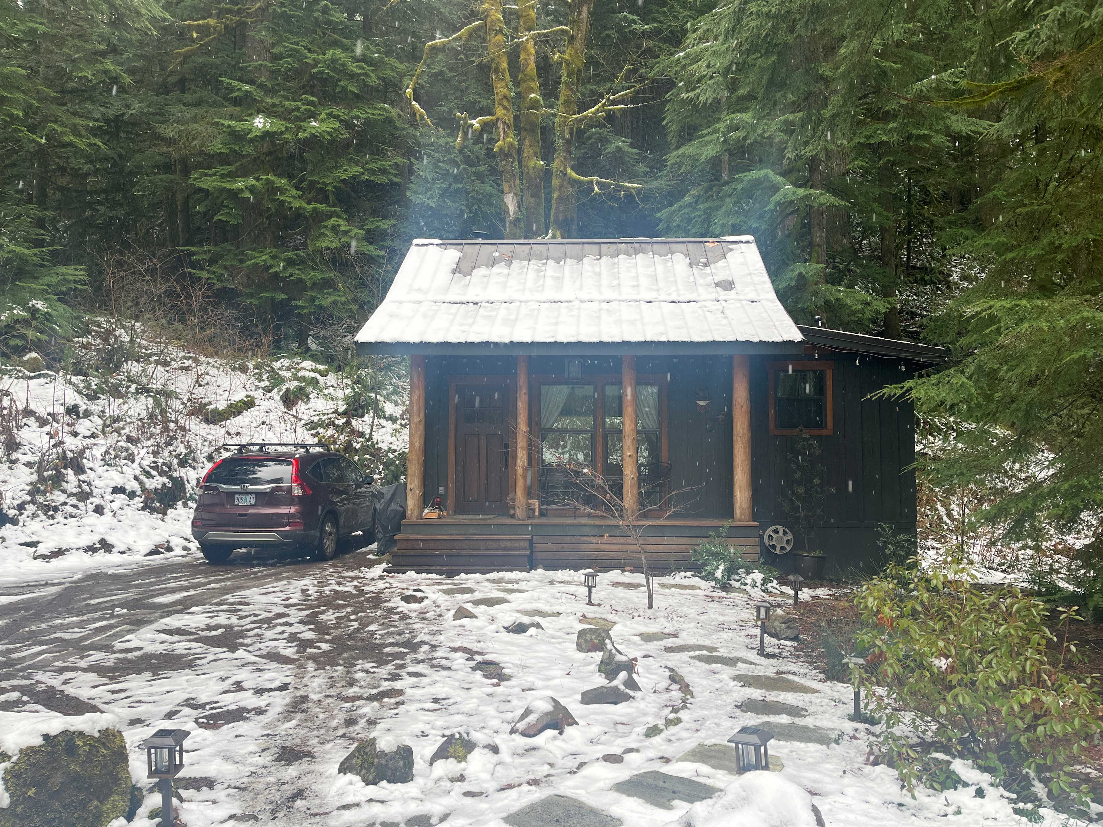 Perfect snowy cabin in the woods