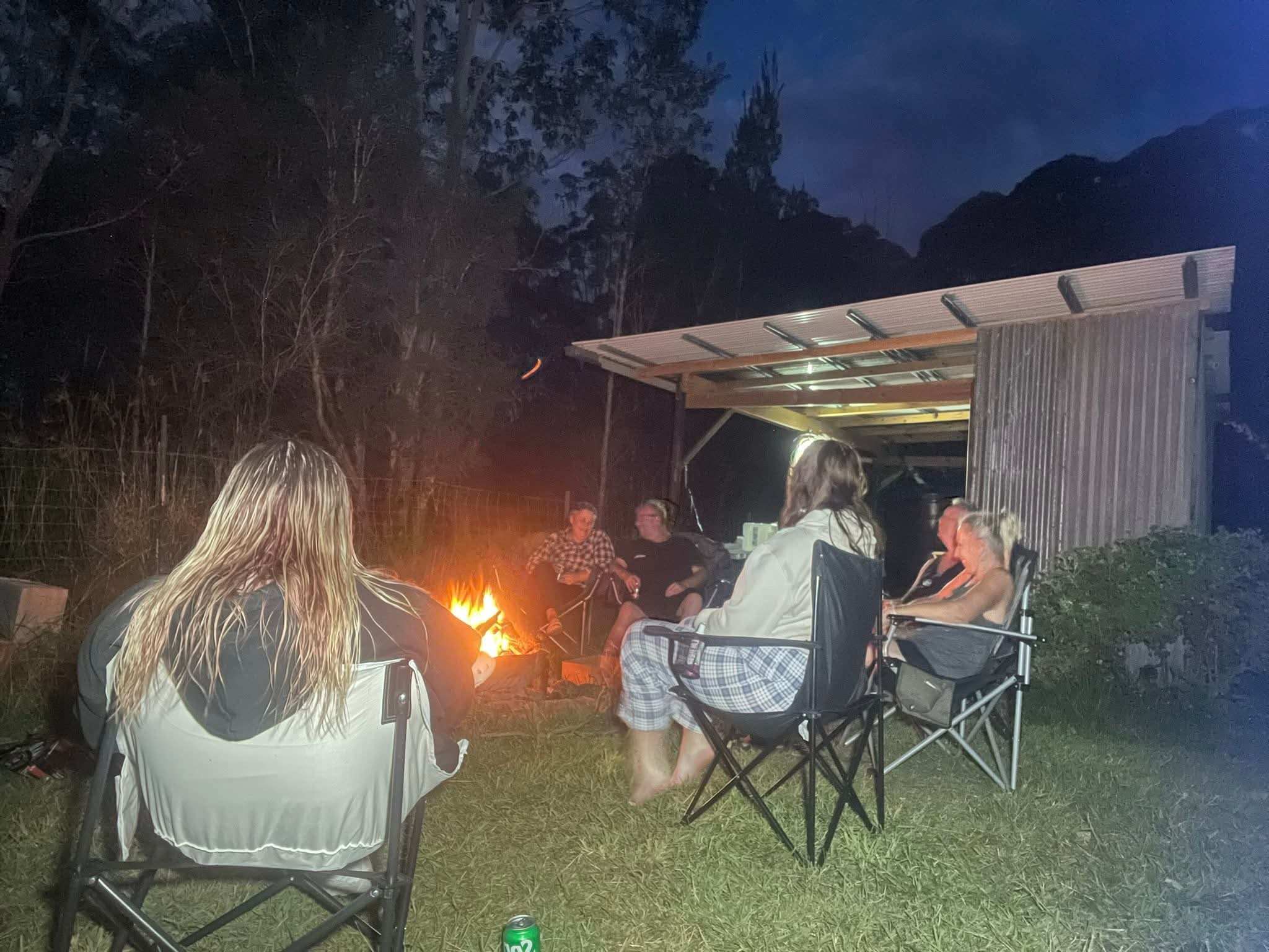 Drinks around the camp fire