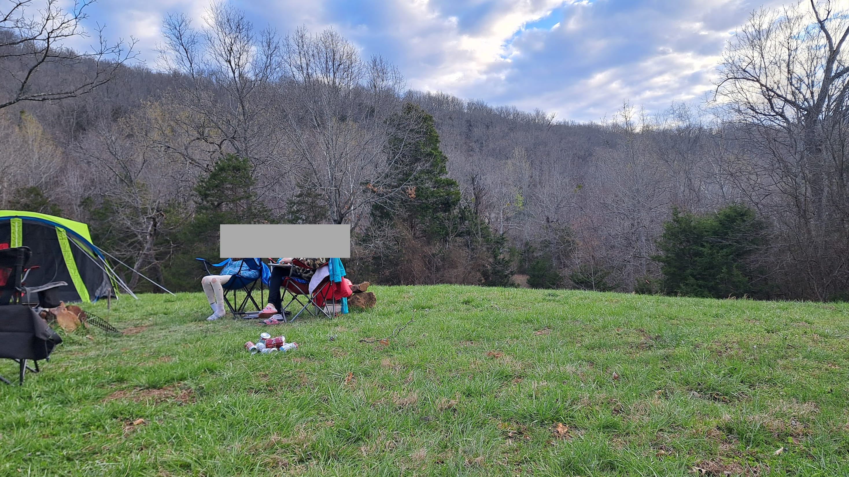 Our campsite, with the mountains all around and a frog pond down the hill.
