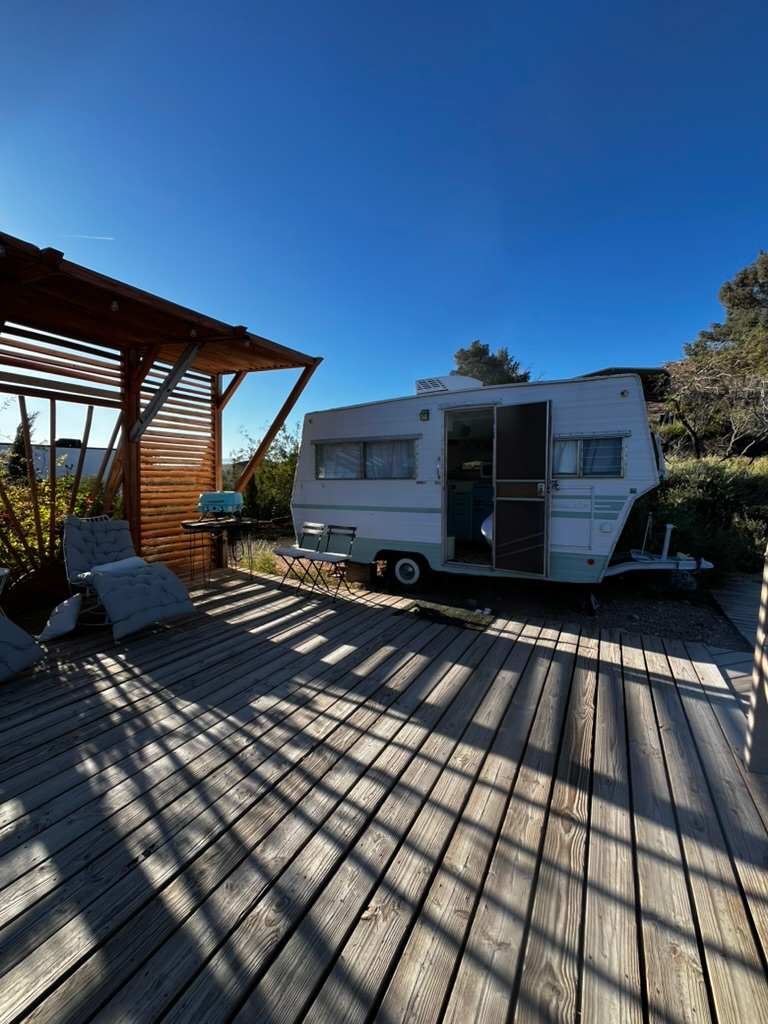 Retro Camper with Mountain Views