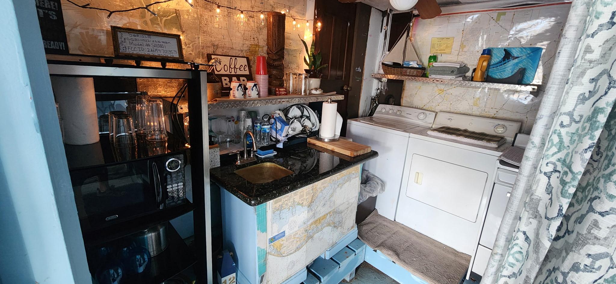 This is the kitchen. Do not plan to cook here but there is a microwave.