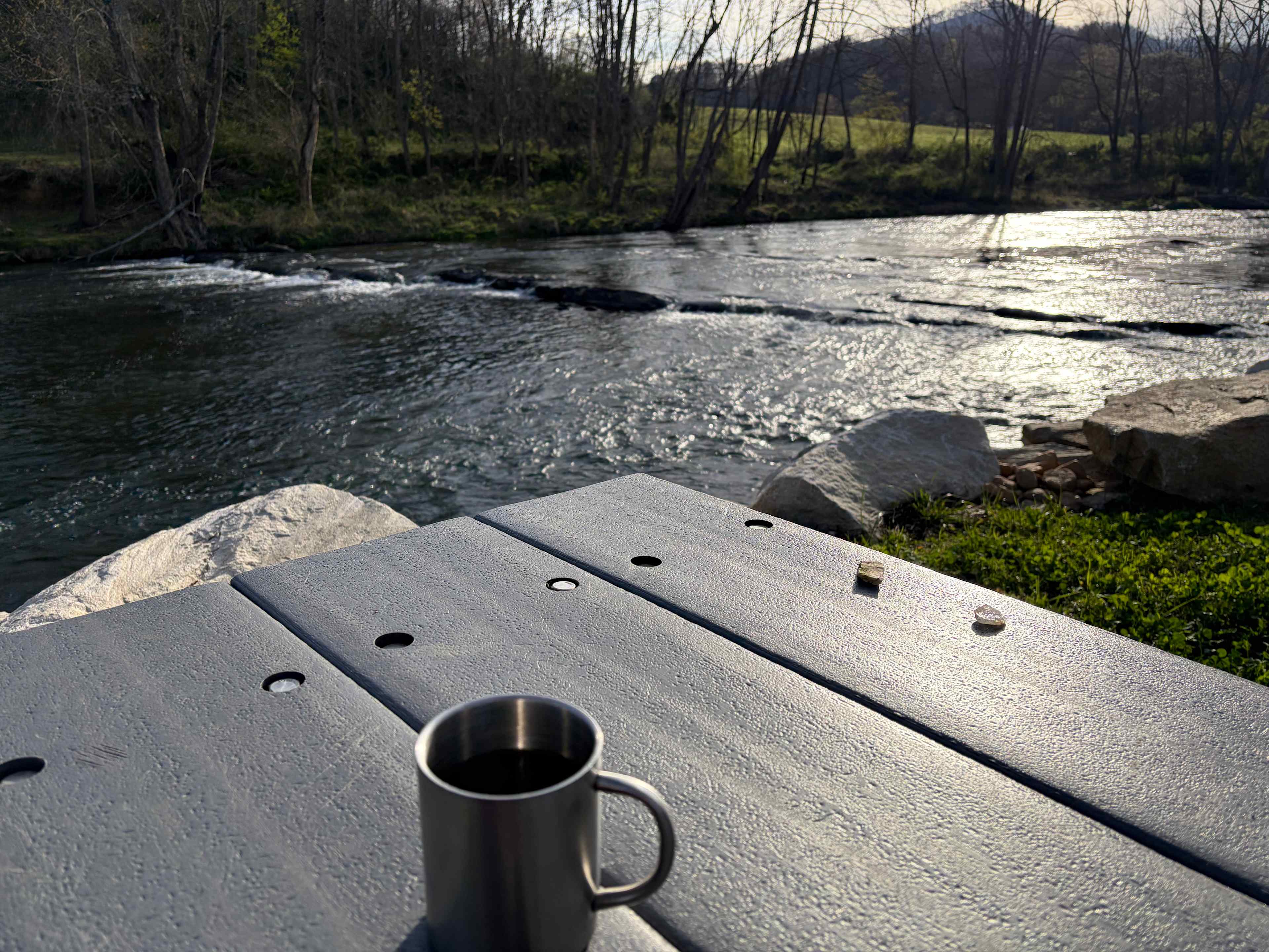 Morning coffee at our camp site by the river