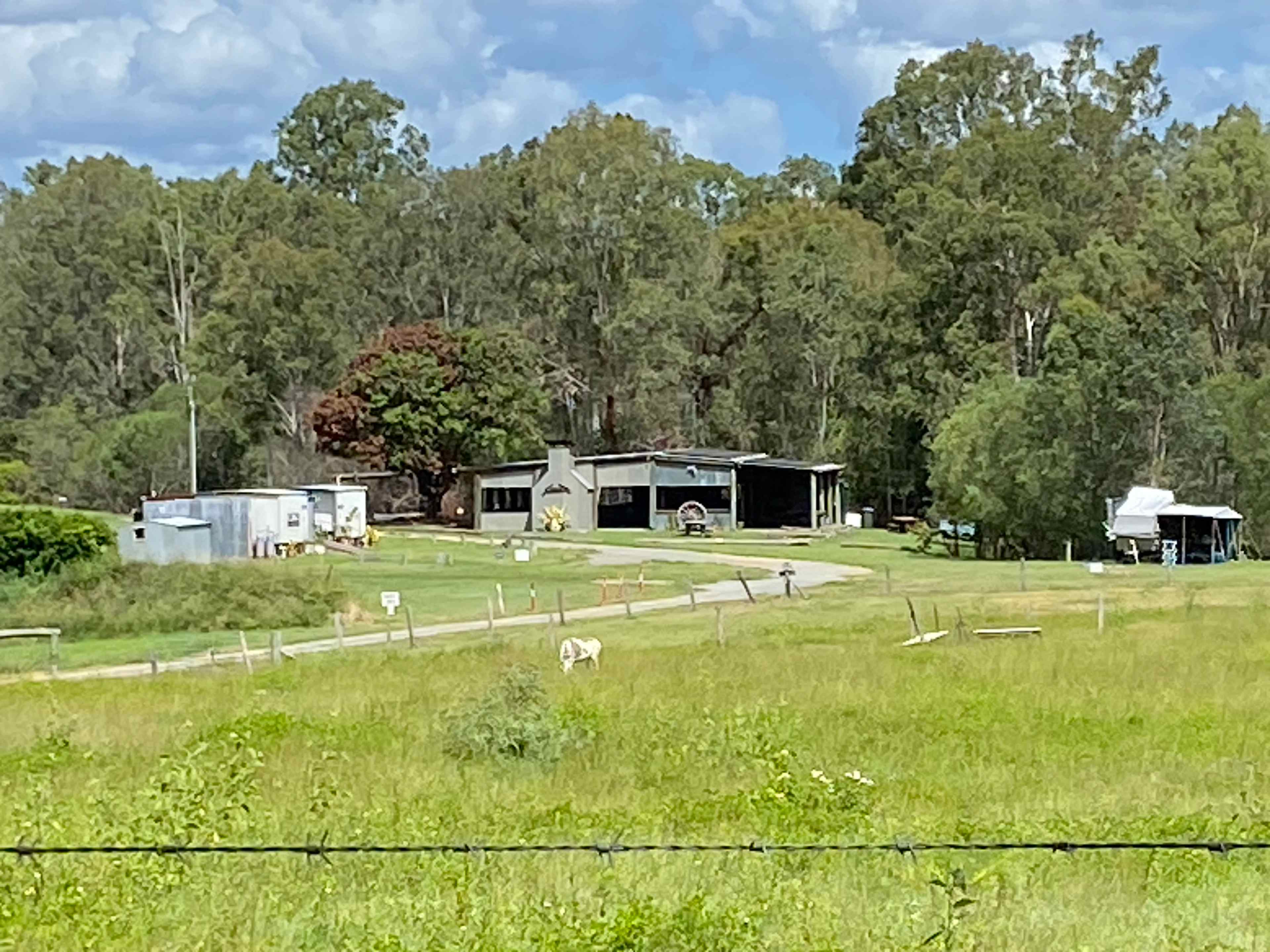 Camp Kitchen and on the left Showers and toilets his and hers. They have washing machines there also. Have coins on you. I camped up on the right side of pic. Camp fire at night 