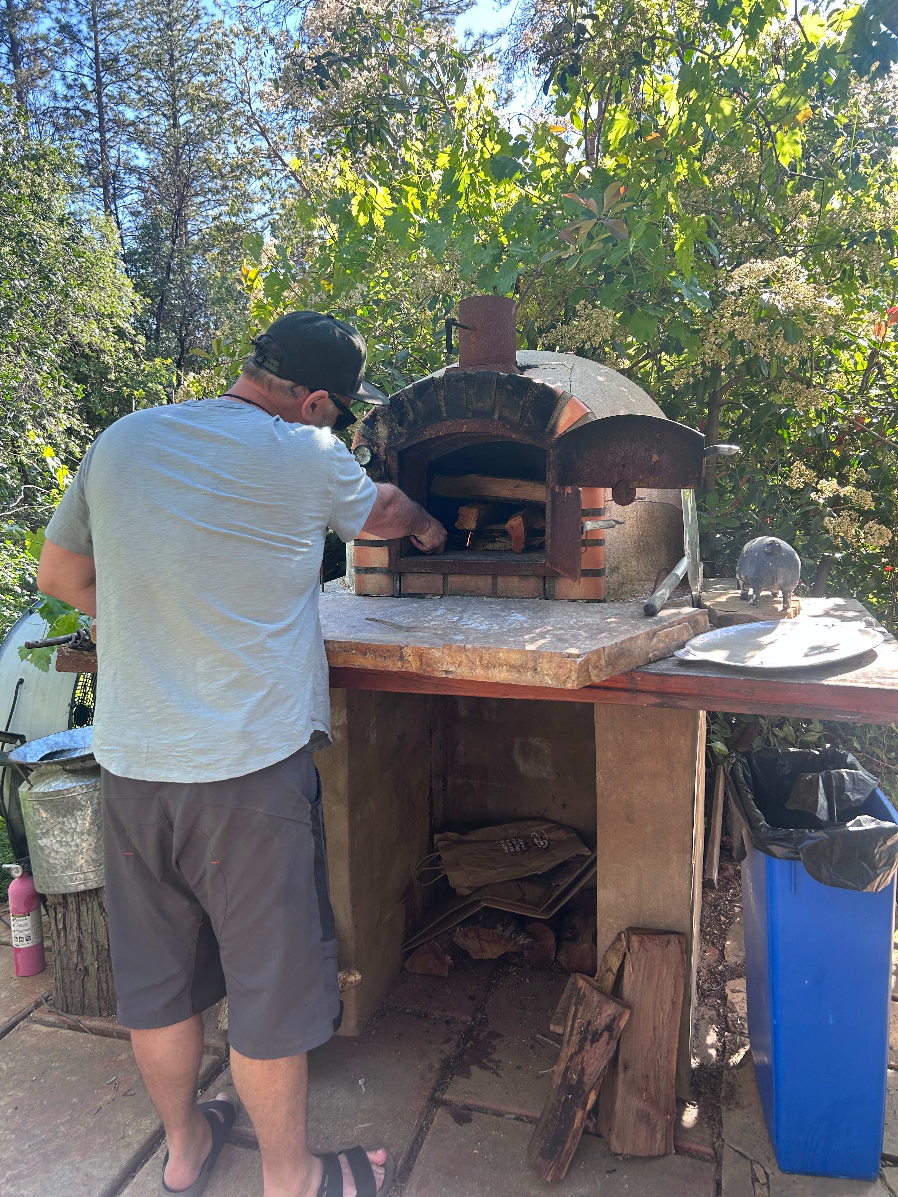 Tending the oven fire 
