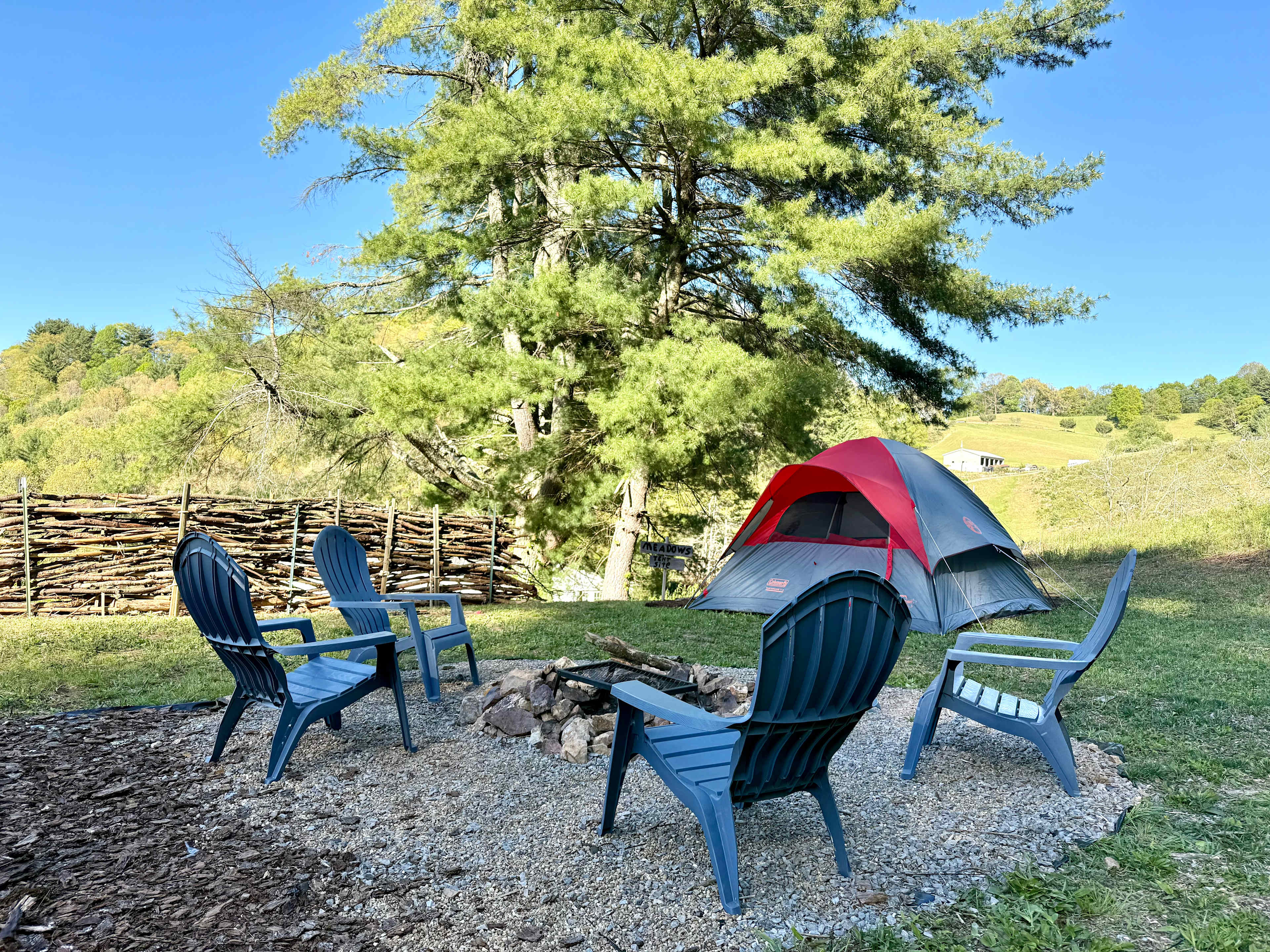 Fire pit with chairs include in meadows site.  