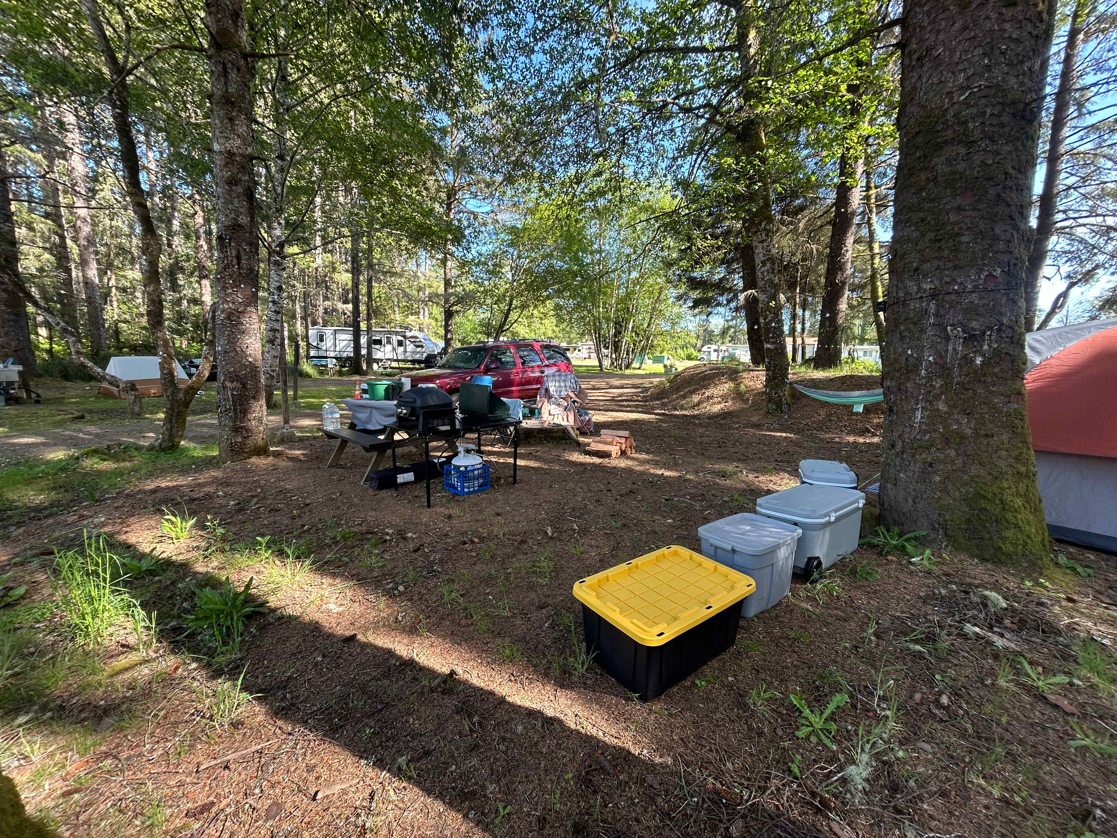 Tent site 1 - facing RV sites. Tent/RV site directly across from ours (left side of photo). Community sink next to the tent/RV site (you can see a little bit of it on the far left edge of the photo)