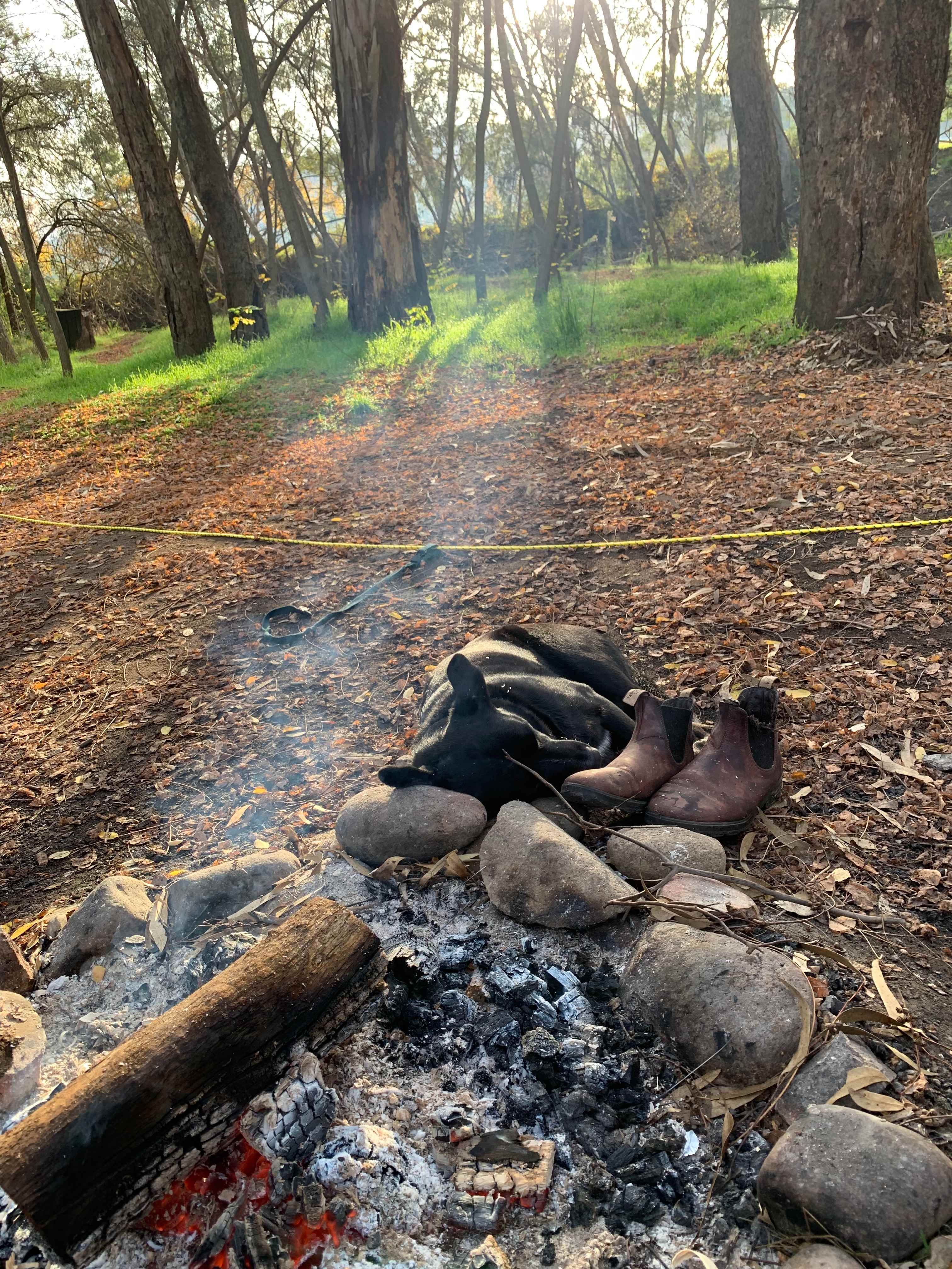Warming up by the fire after a fresh autumn dip in the river 