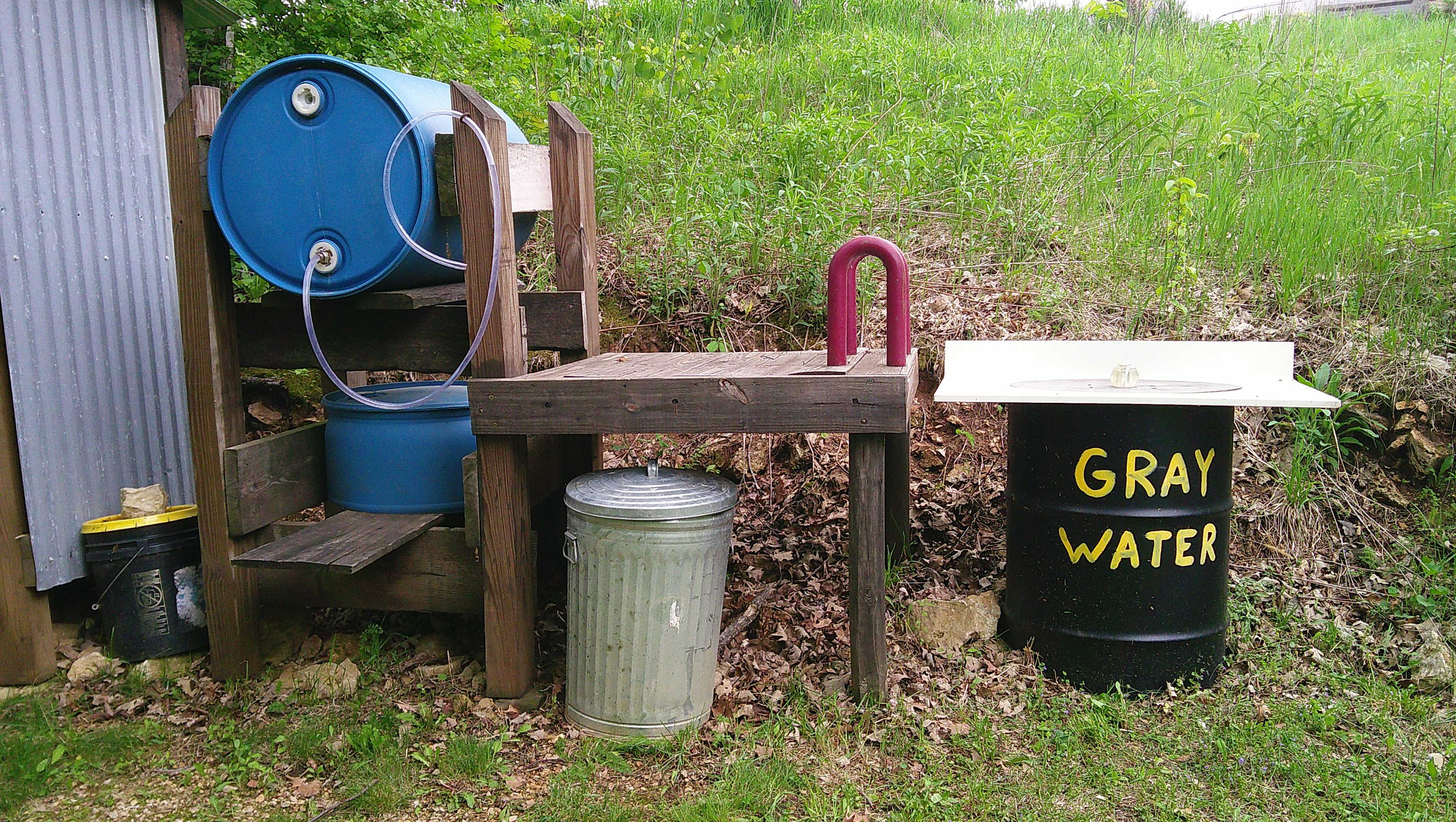 gray water and covered firewood setup