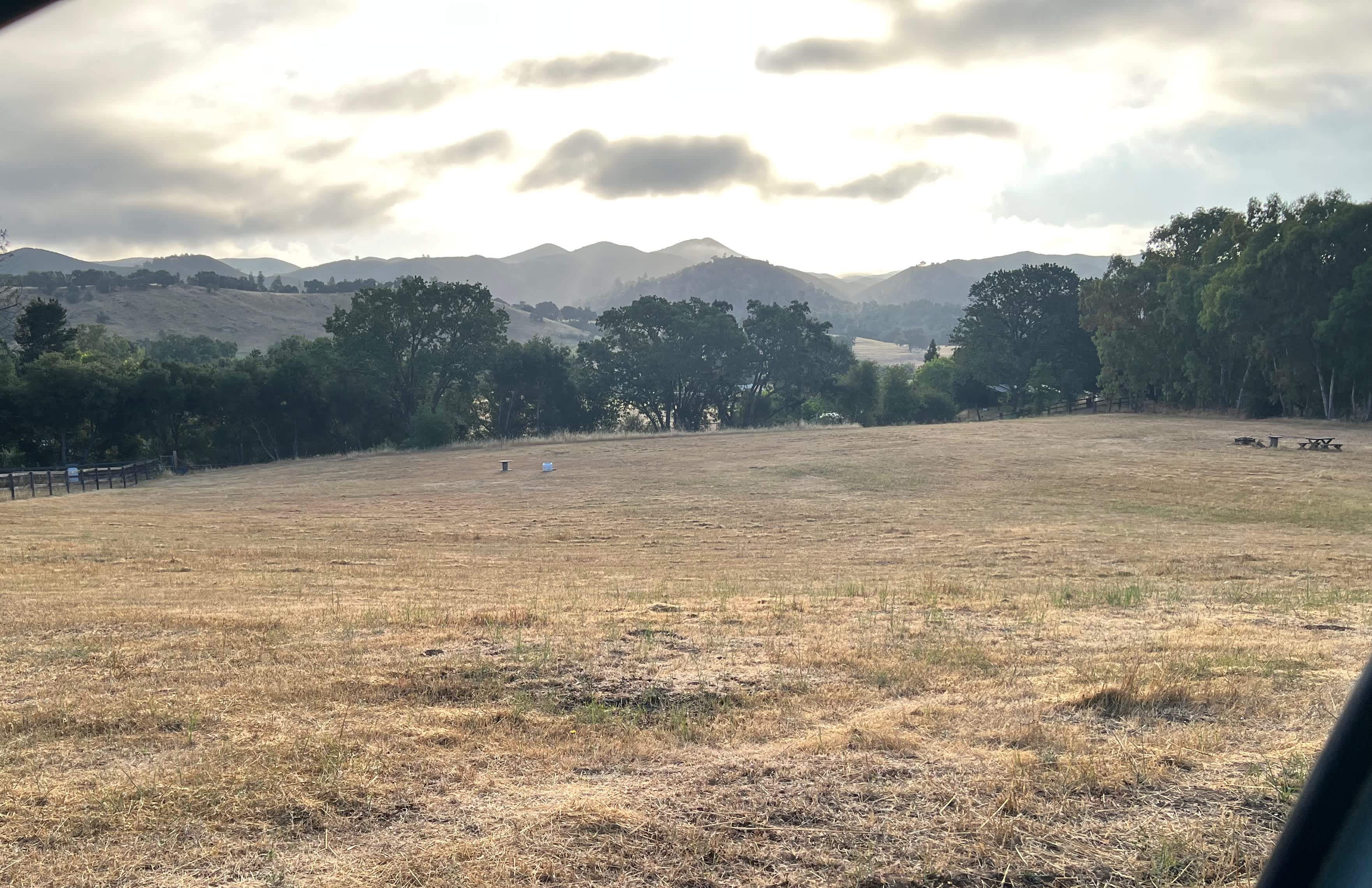 two campsites on a beautiful field