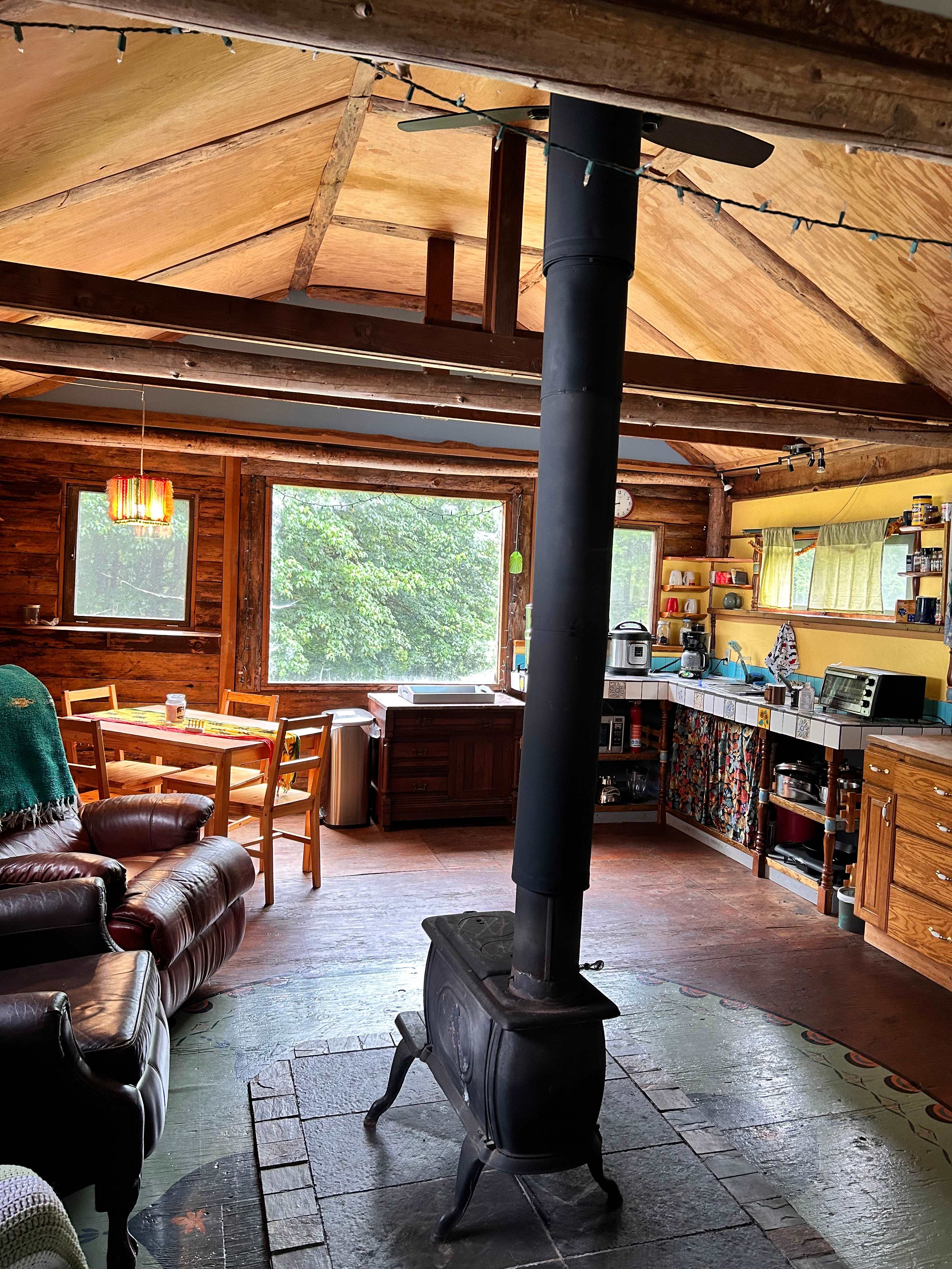 Communal kitchen and living space above barn