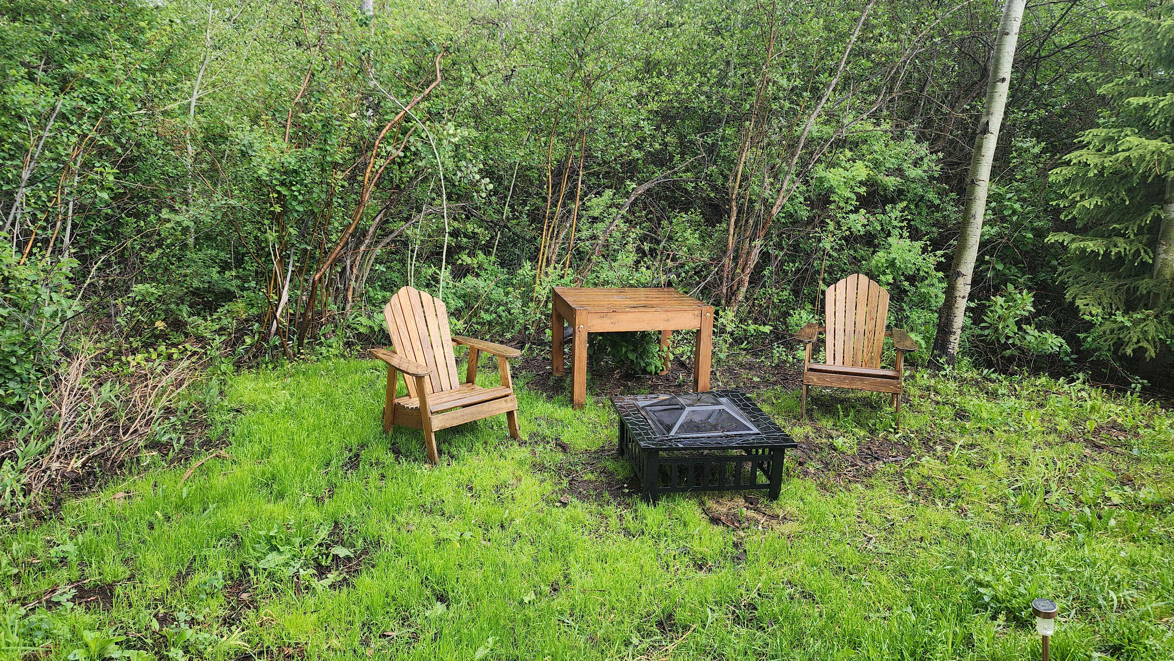 Comfortable seating area with movable firepit