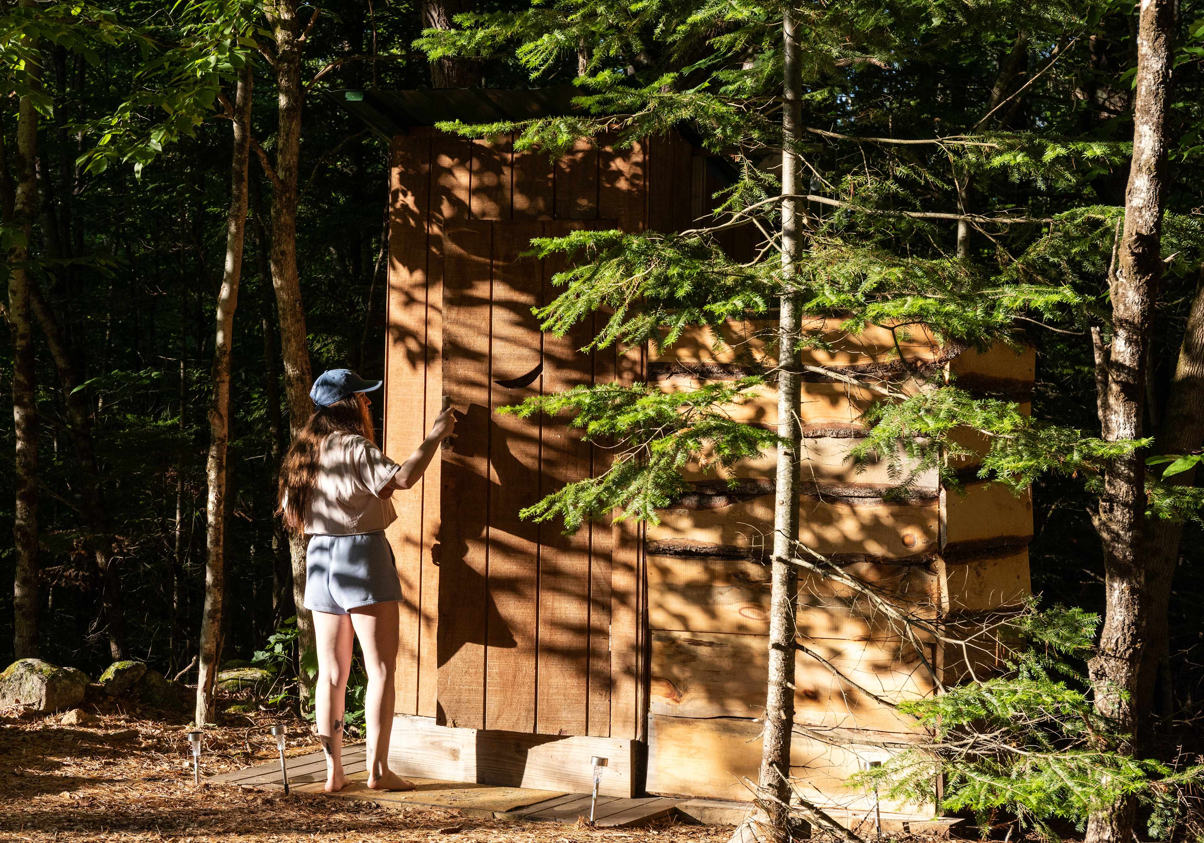 Outhouse with outdoor shower a few yards from the main tent