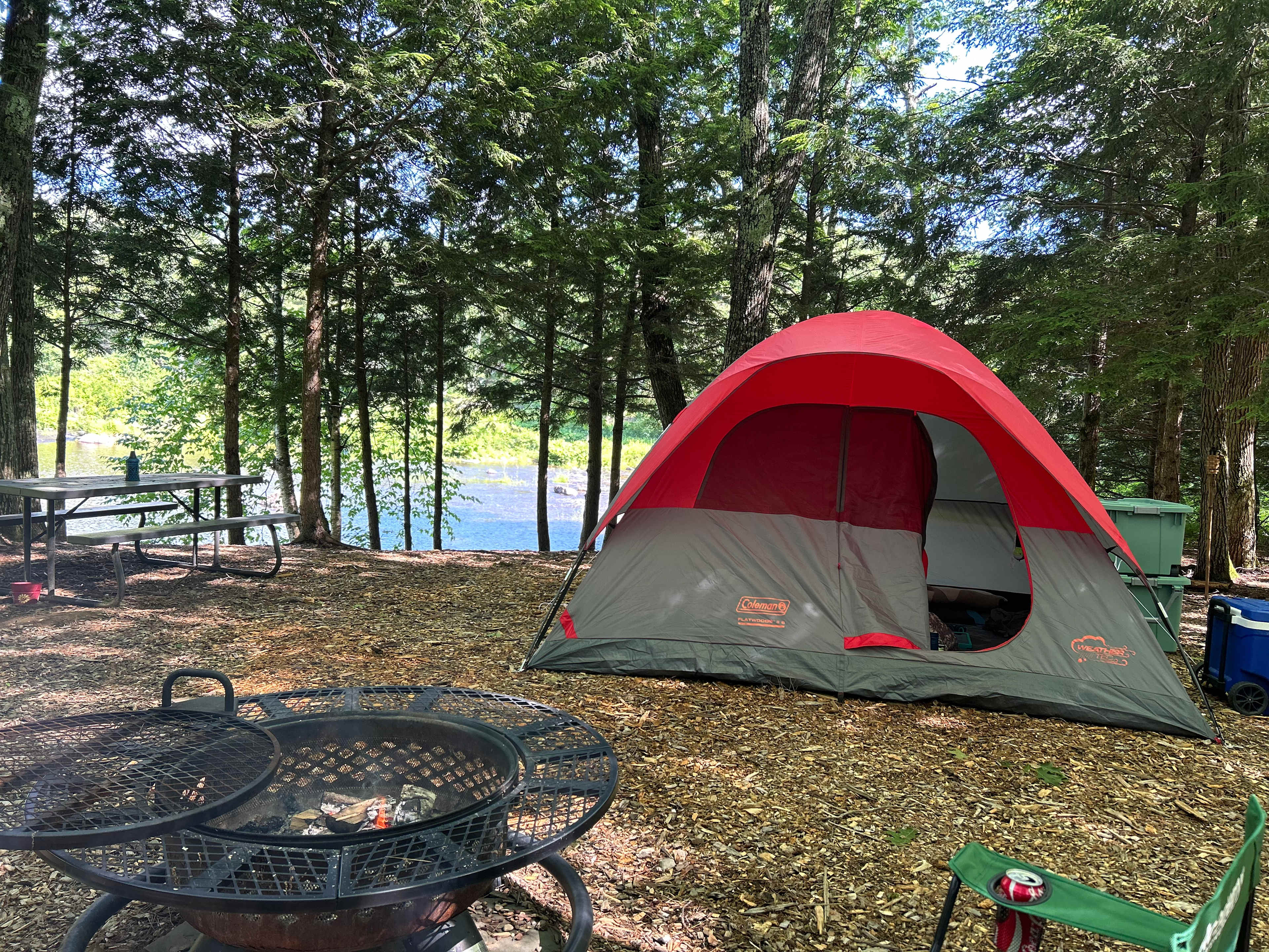 6person tent-firewood with axe was behind the tent, we set up camp shower to the left of this frame