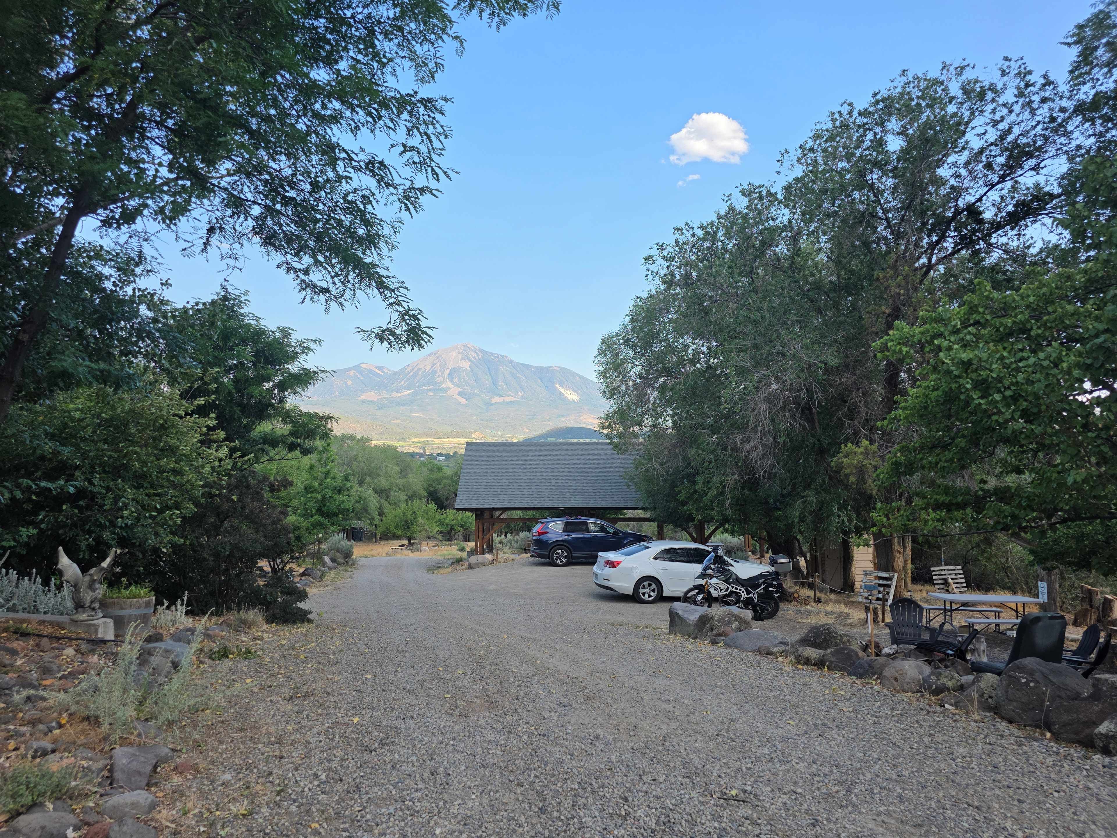 View from the common area towards the entrance, parking lot, and covered seating area