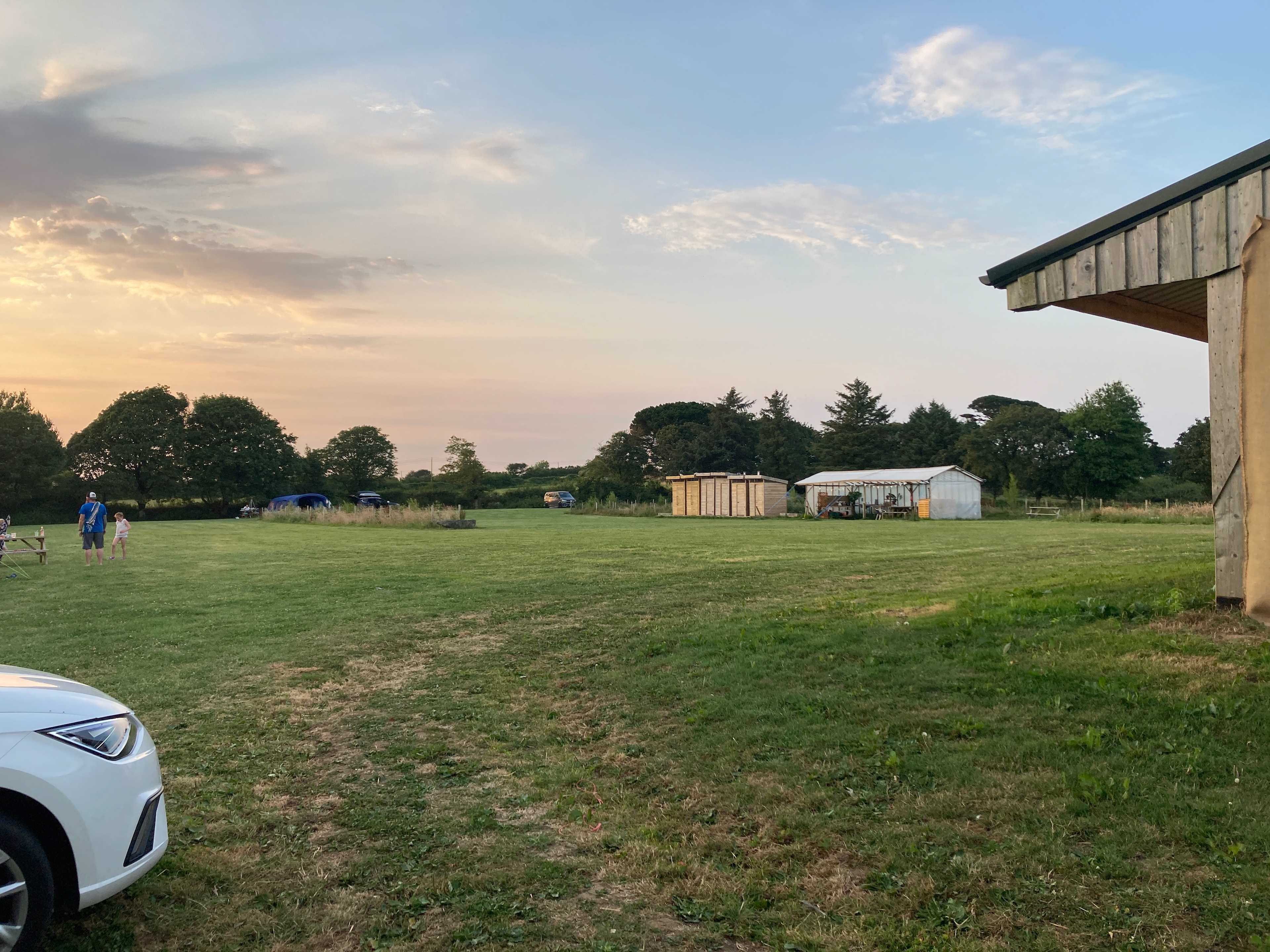 Washrooms, showers and kitchen in the distance
