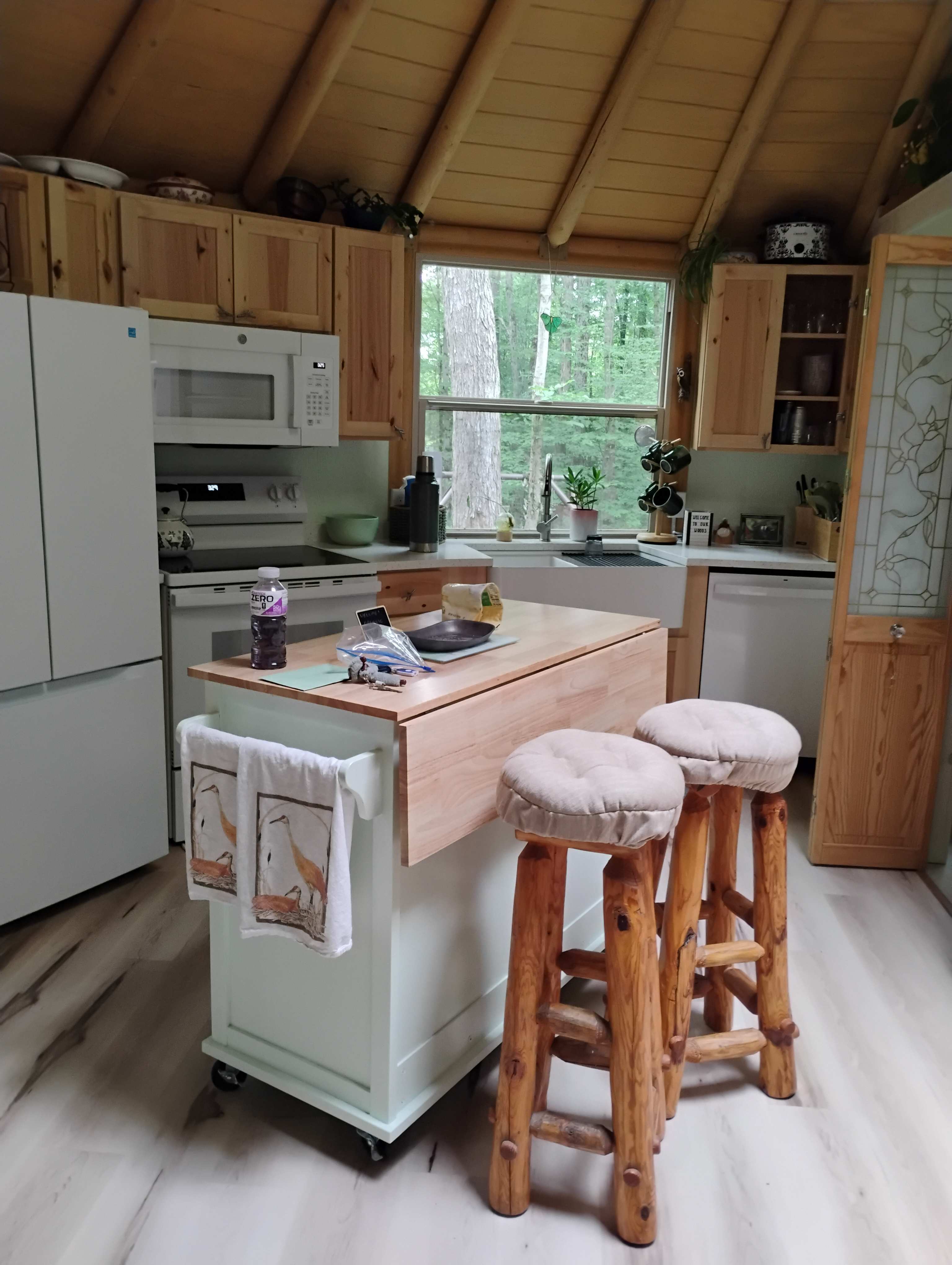 Kitchen has everything you need plus a washer/dryer.