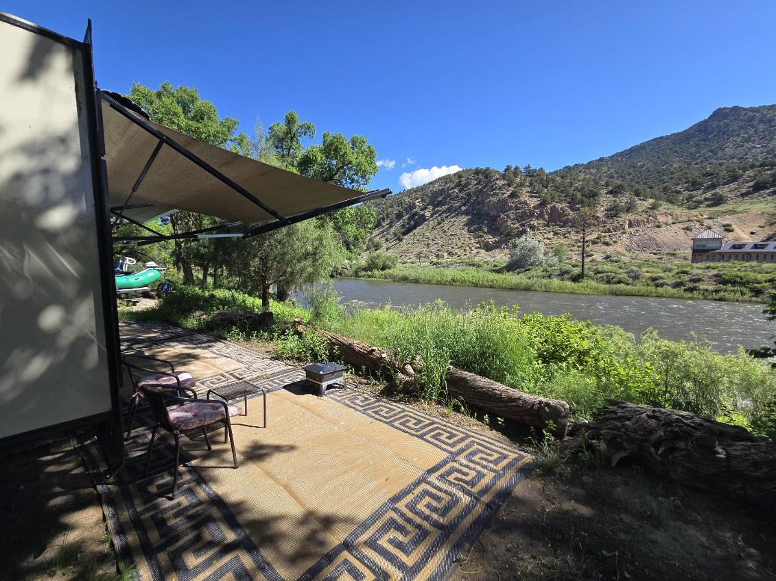 You'll be able to see and hear the river but will use one of the paths or road to the boat ramp to access the river.
