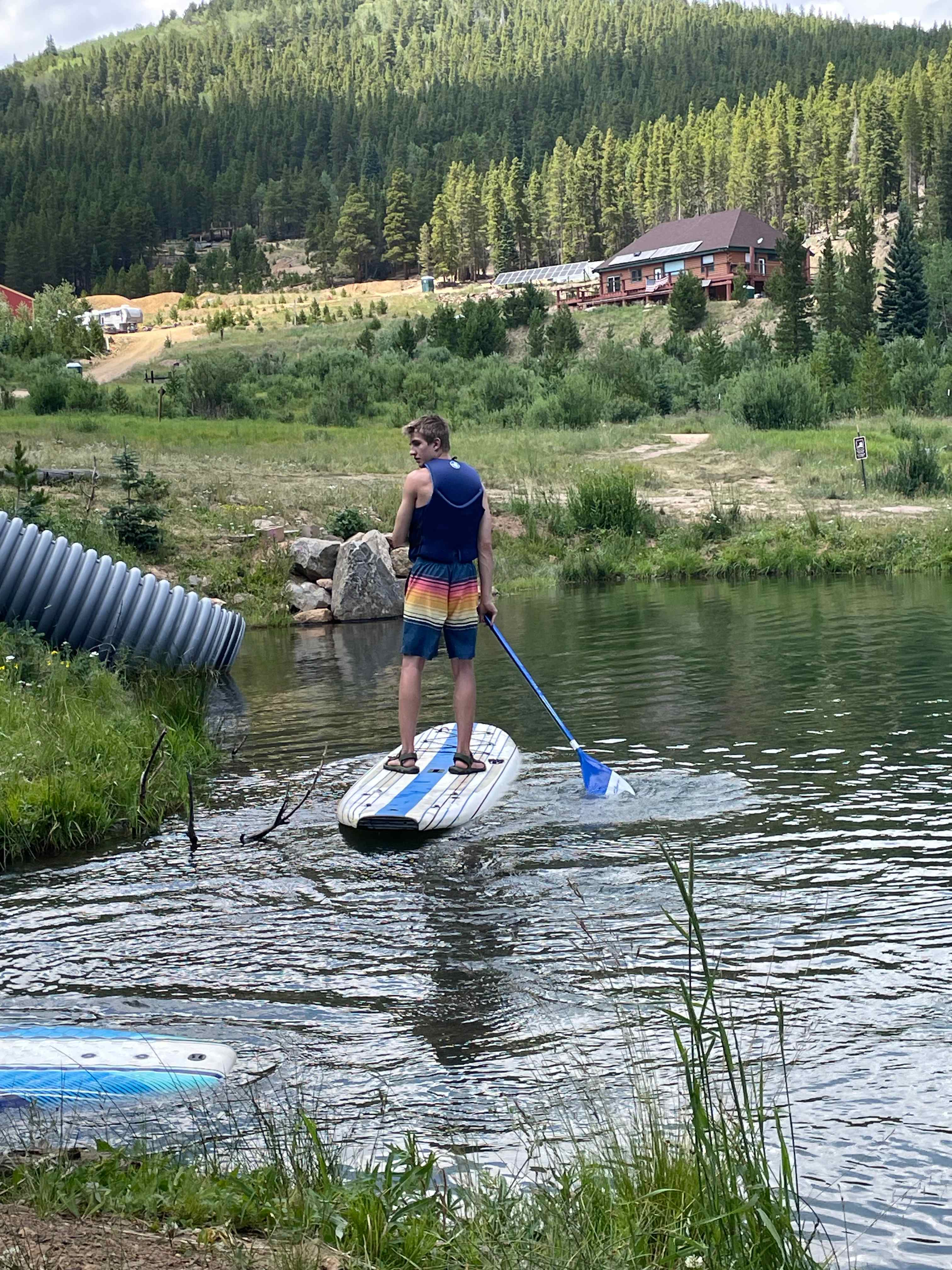 Enjoying paddle boarding at the pond!