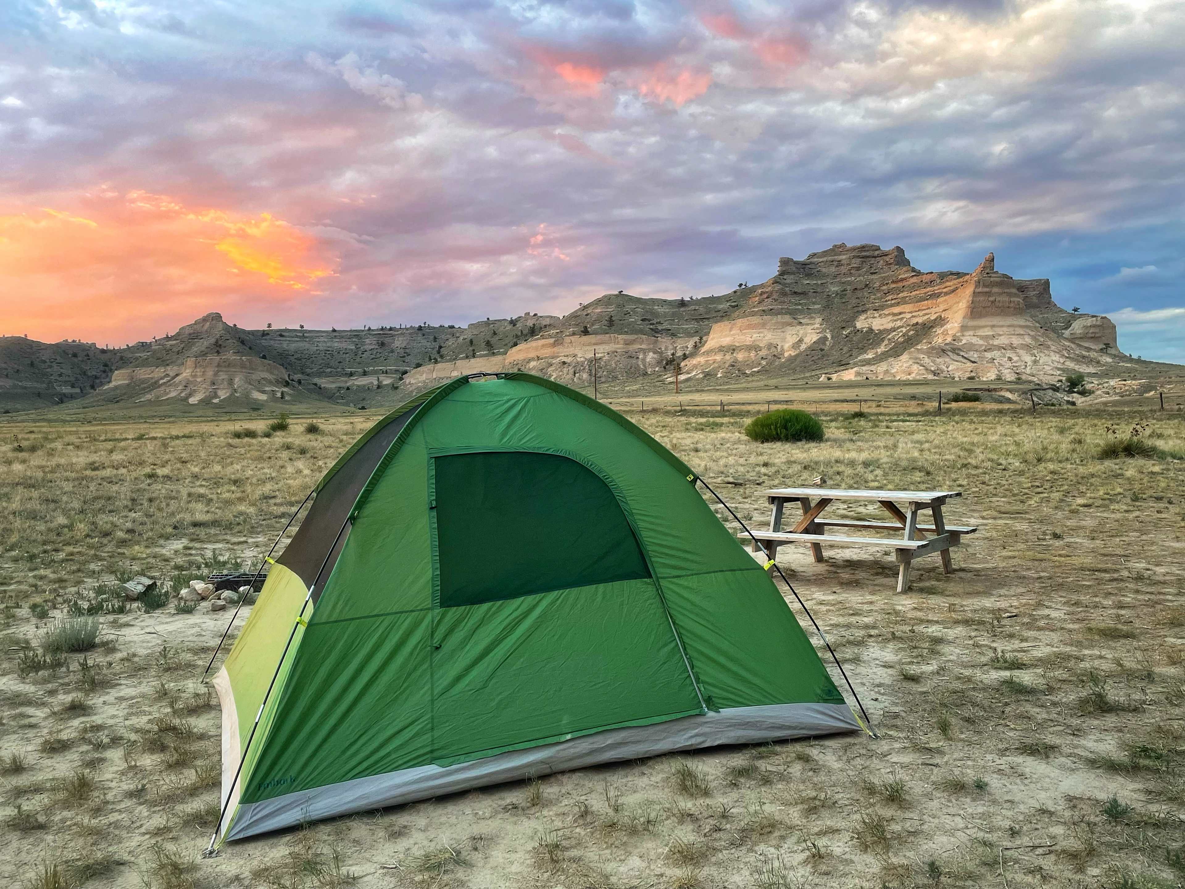 Tent at sunset by Scott’s Bluff