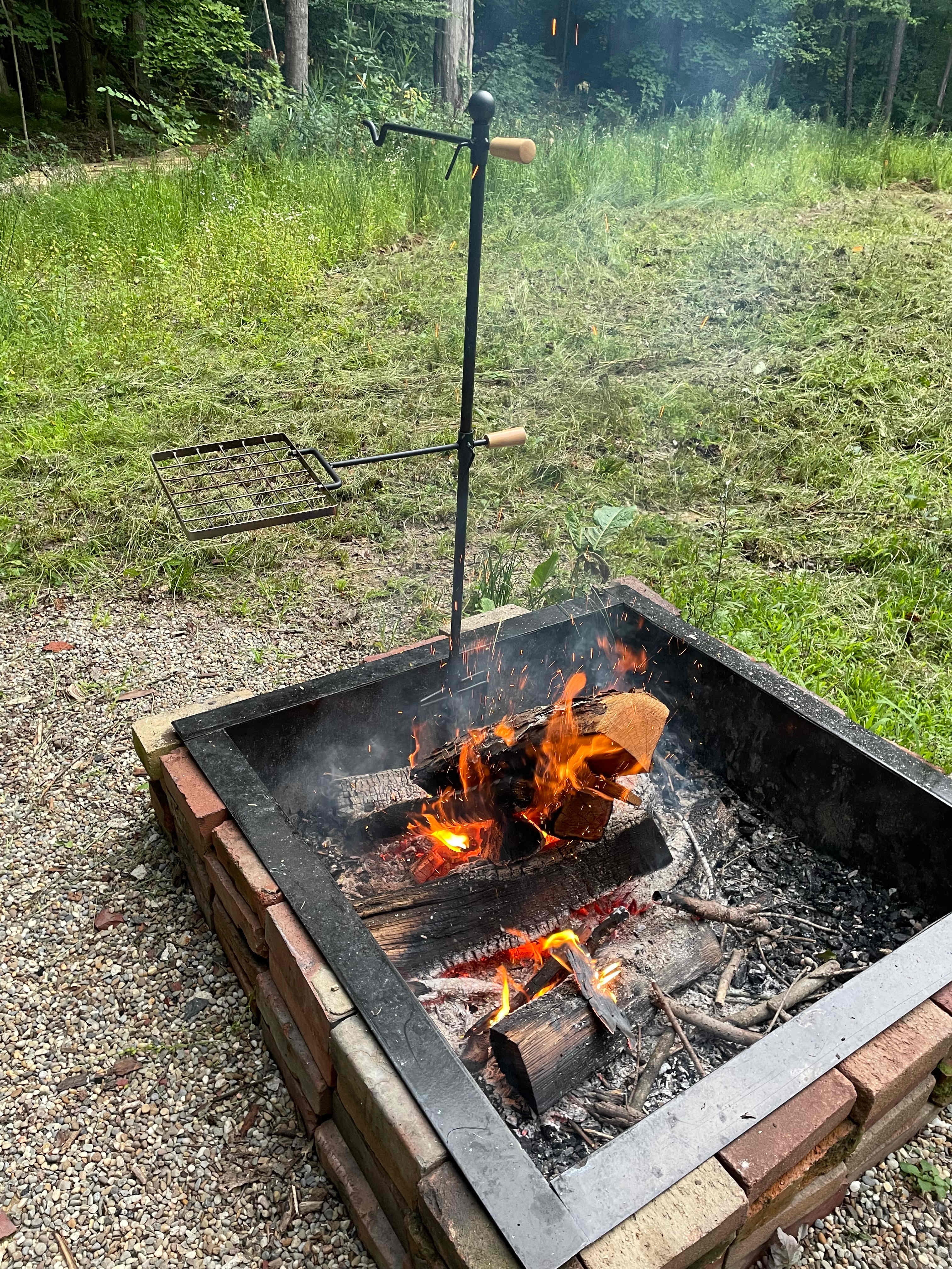 Awesome firepit! (The swivel grill stake is ours)